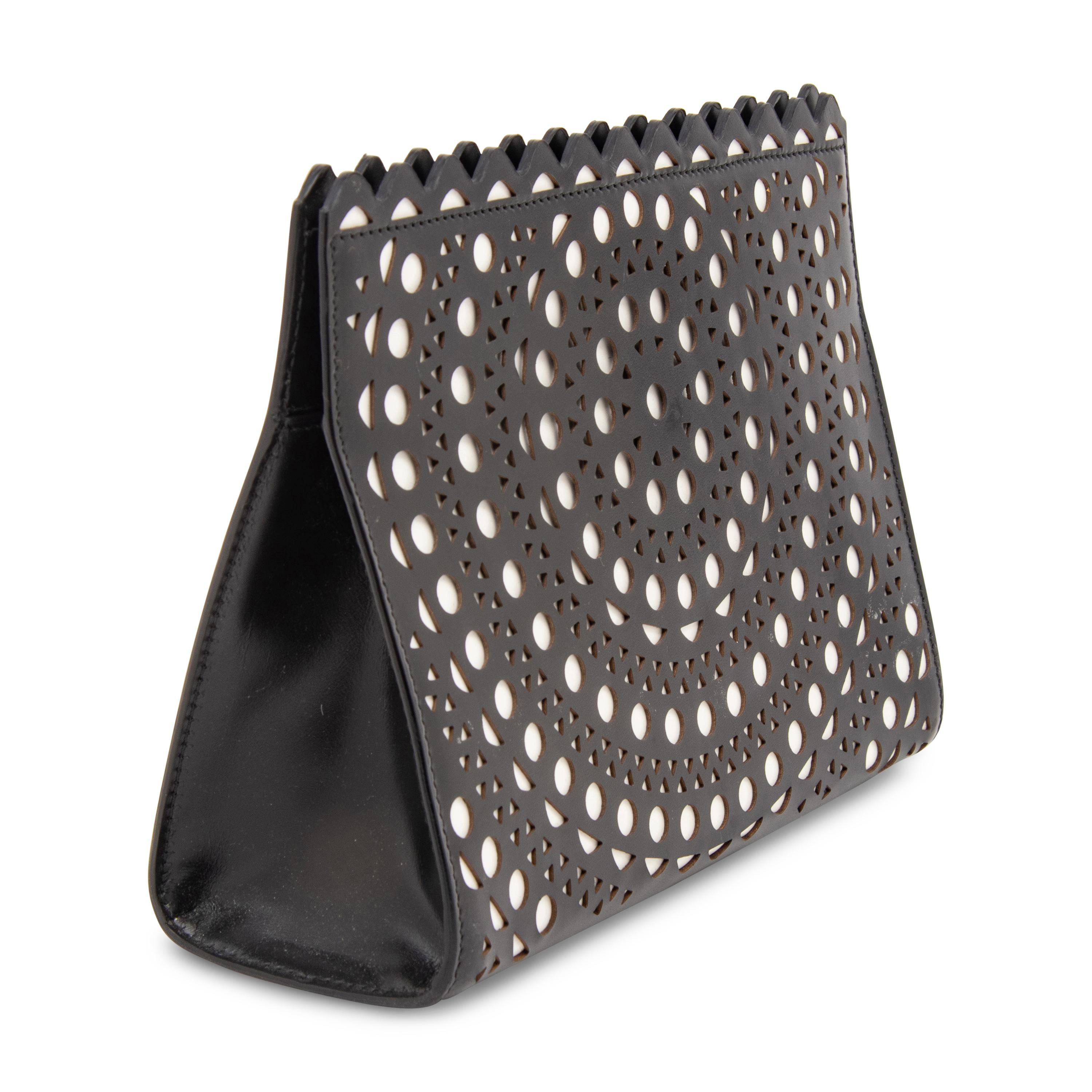 ALAÏA, LASER-CUT LEATHER CLUTCH