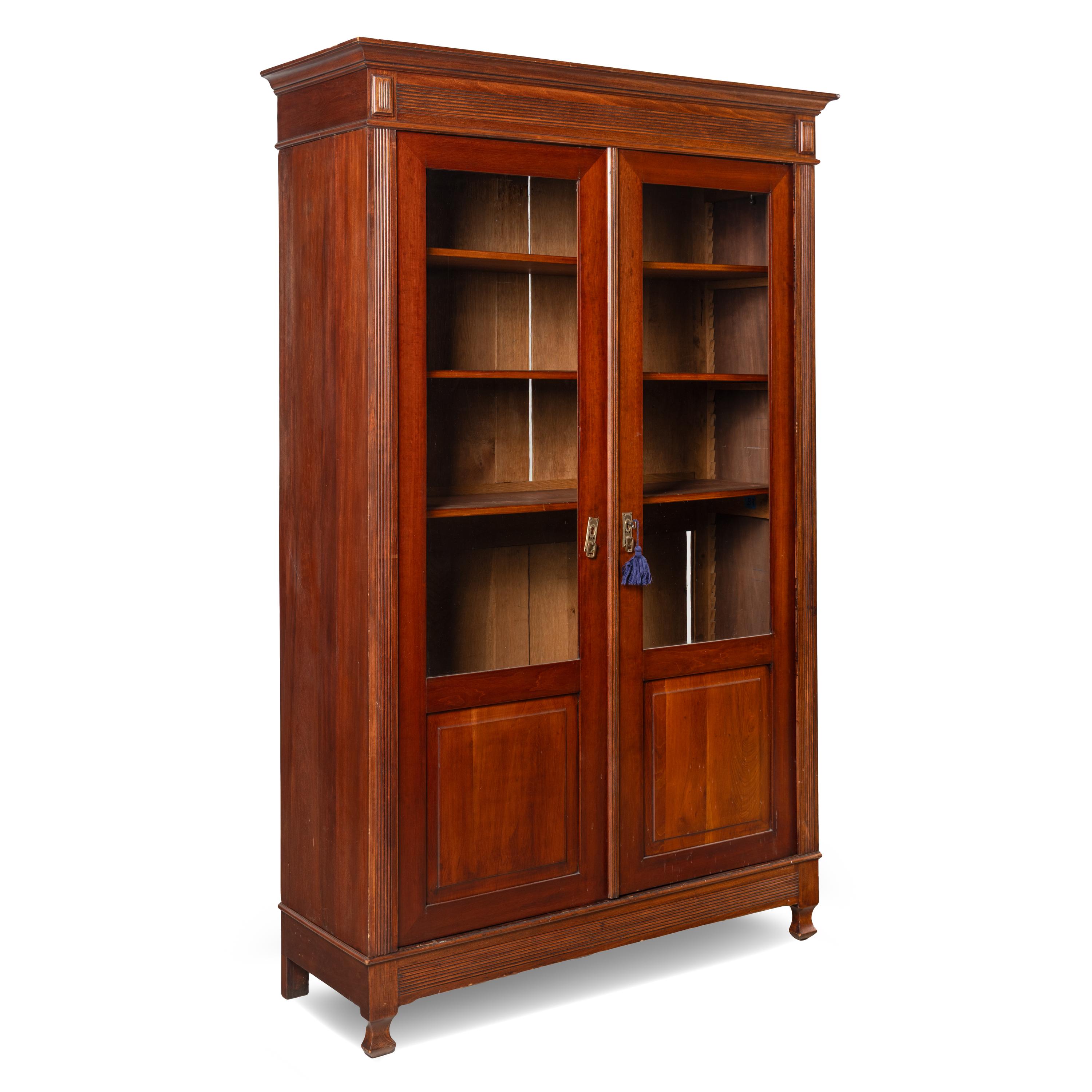 A Pair of English Mahogany Bookcase Cabinets