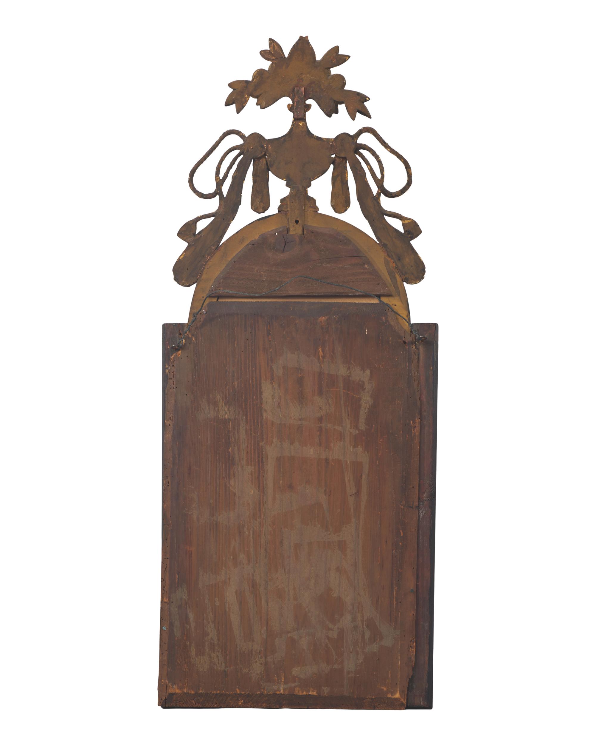 A Spanish "Bilbao" Walnut-Veneered and Parcel-Gilt Mirror For the American Market
