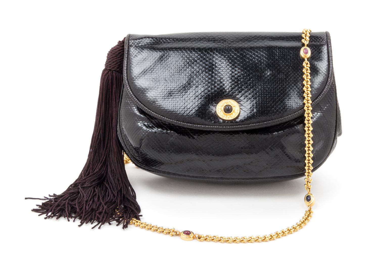 A Judith Leiber Black Reptile Skin Clutch, 8" x 5.5" x 1.5".