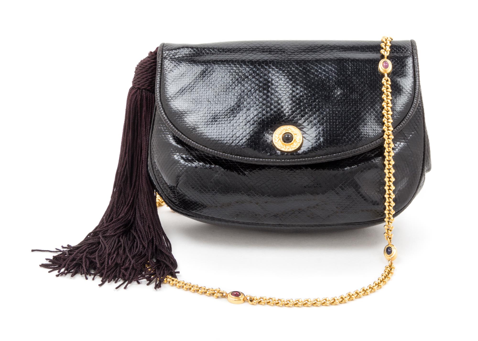 A Judith Leiber Black Reptile Skin Clutch, 8" x 5.5" x 1.5".