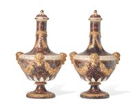 A Pair of Wedgwood Parcel Gilt and Mottled Glazed Lidded Barber’s Bottles