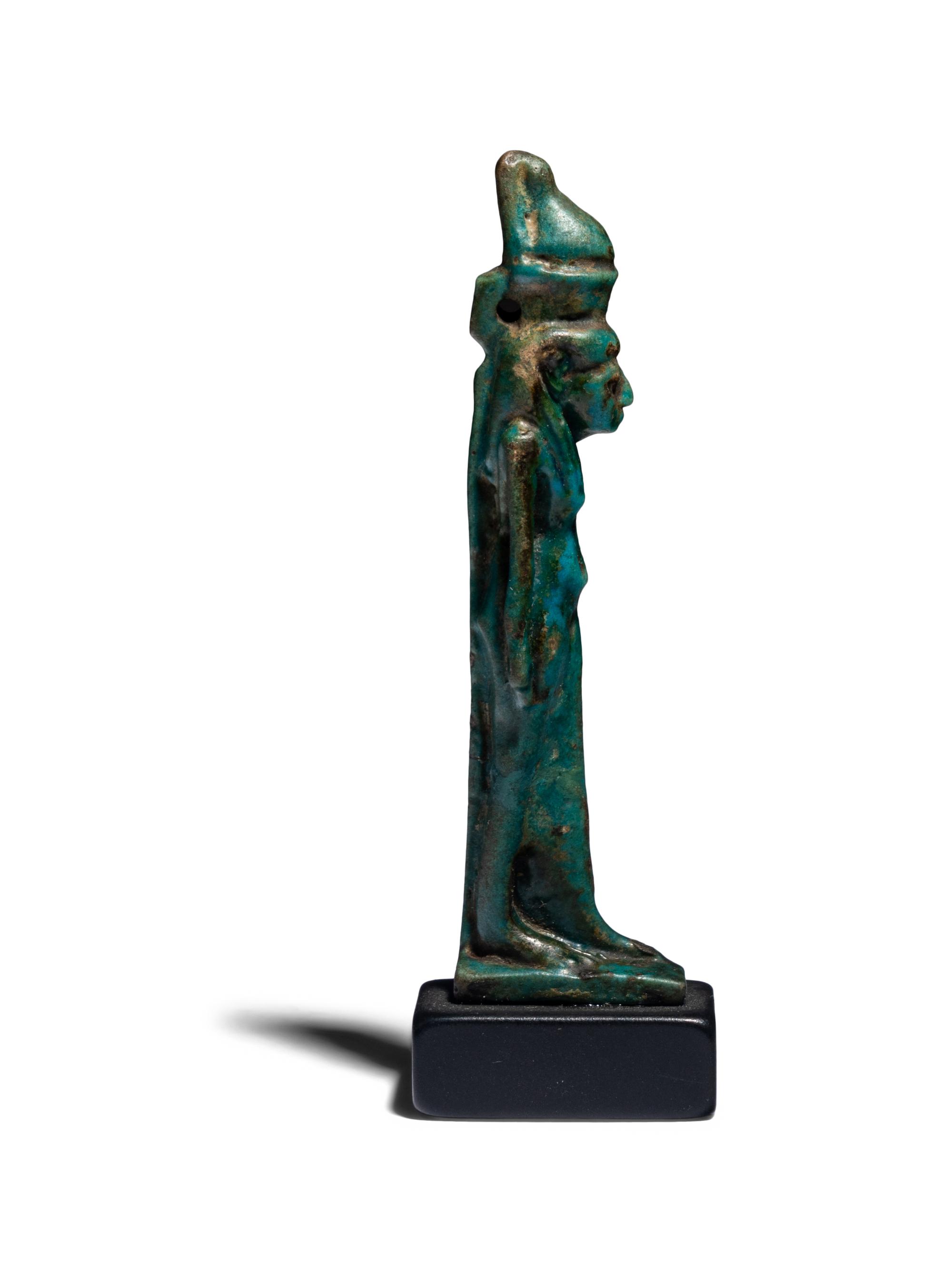 An Egyptian Faience Mut Amulet
