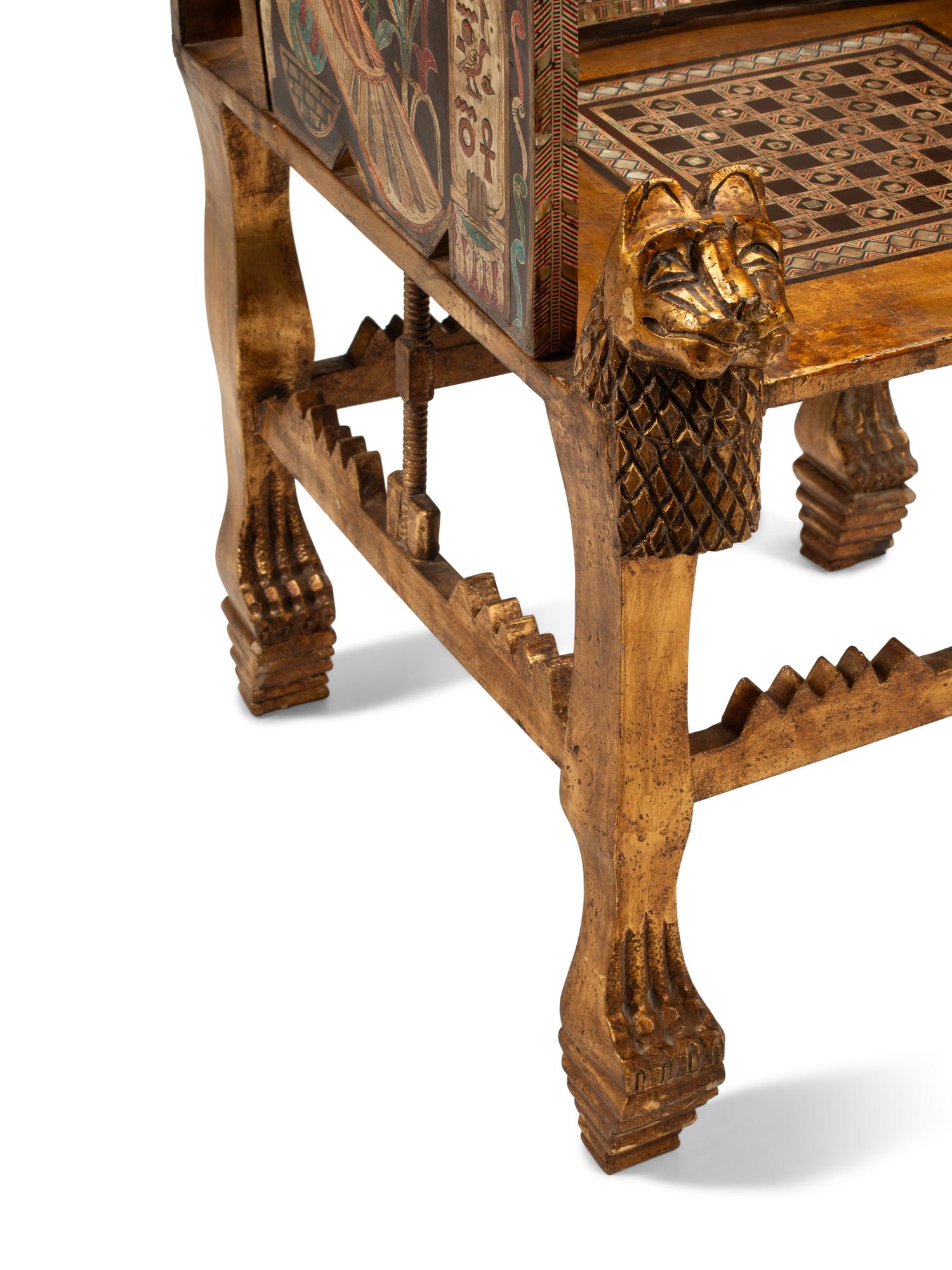 An Egyptian Style Abalone Inlaid Marquetry and Giltwood Armchair