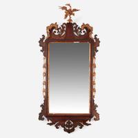 A Chippendale fret-carved mahogany and parcel-gilt looking glass 18th / 19th century