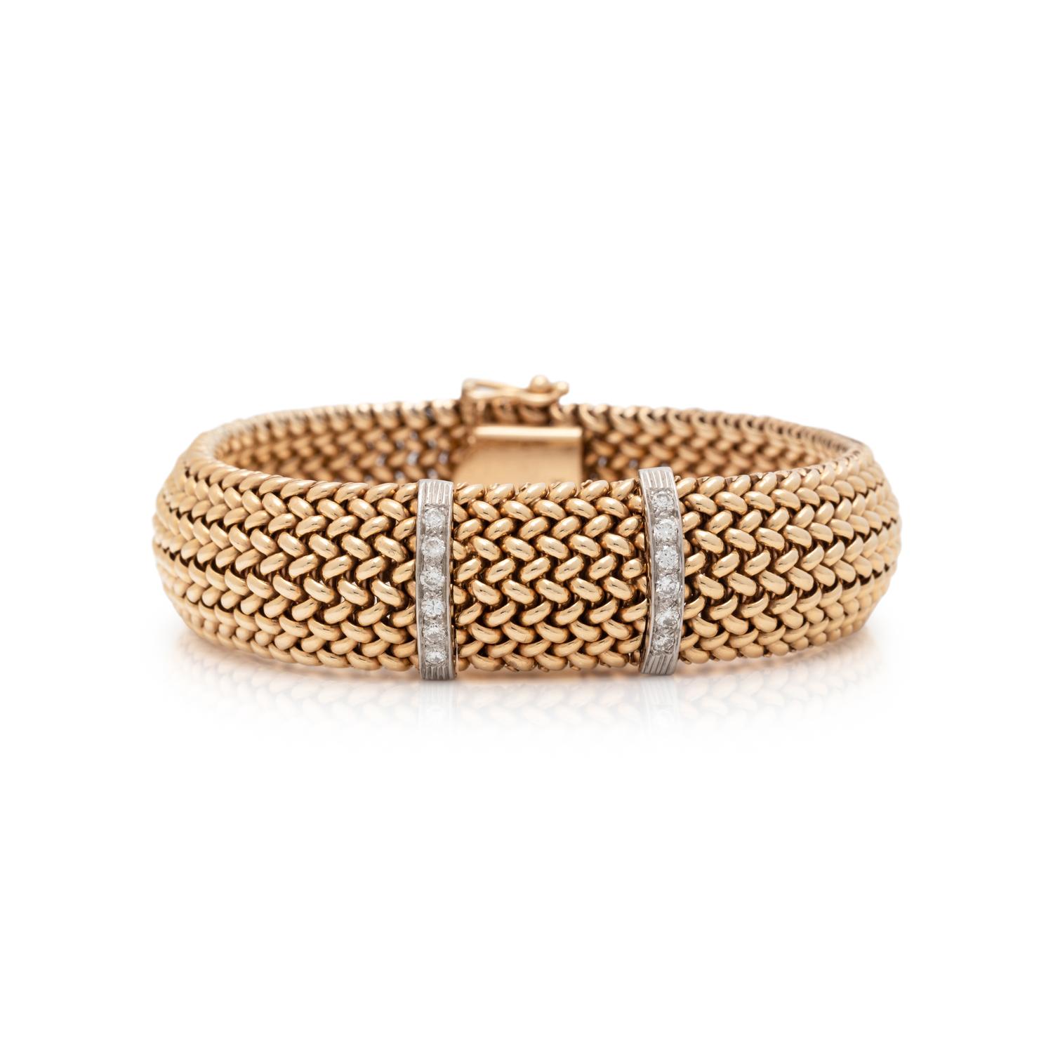 OLGA TRITT, YELLOW GOLD AND DIAMOND SURPRISE WATCH