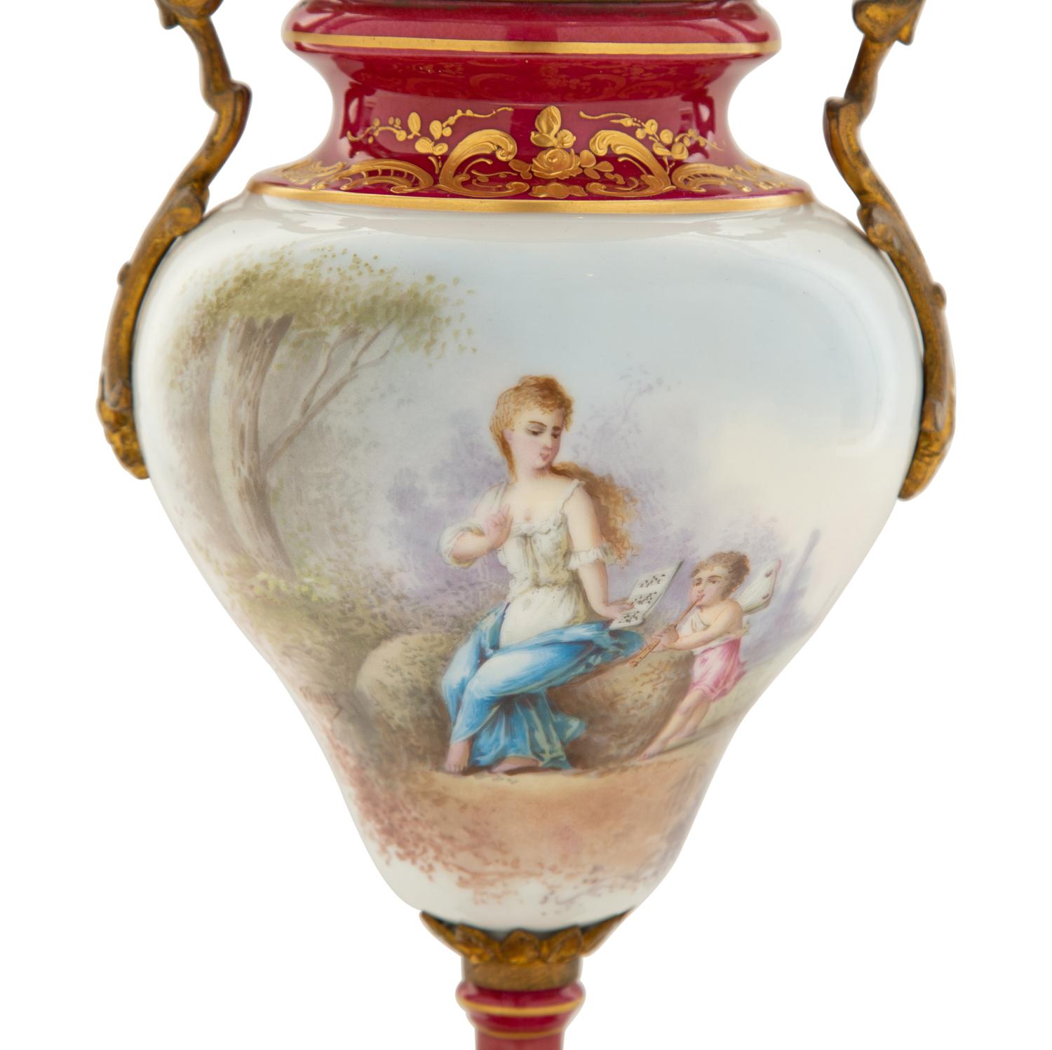 A Gilt Metal Mounted Sèvres Style Porcelain Urn