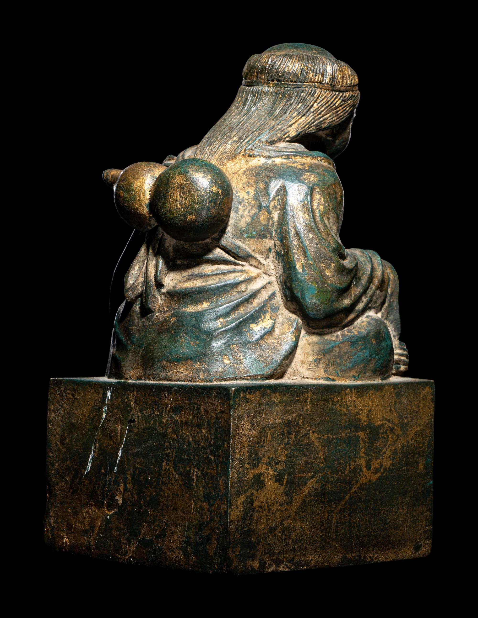 An Unusual Set of Two Parcel-Gilt Wood ' Liuhai and Toad' Seals