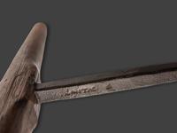 A Group of Early Cast Iron and Wood Farm and Carpentry Tools