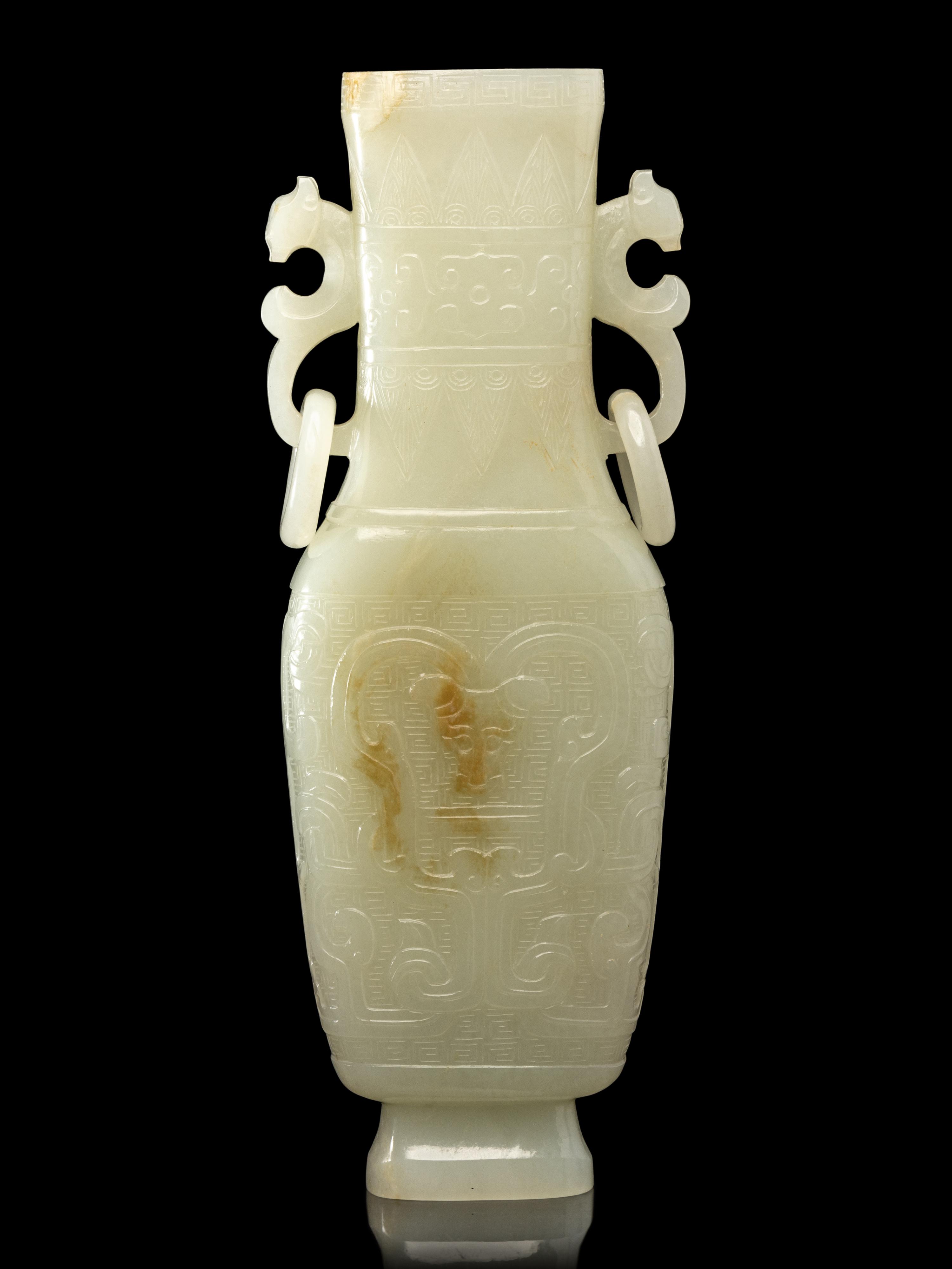 A Chinese Pale Celadon Jade Flattened Vase, Late Qing/Republic Period 晚清/民國 青白玉仿古雙耳瓶