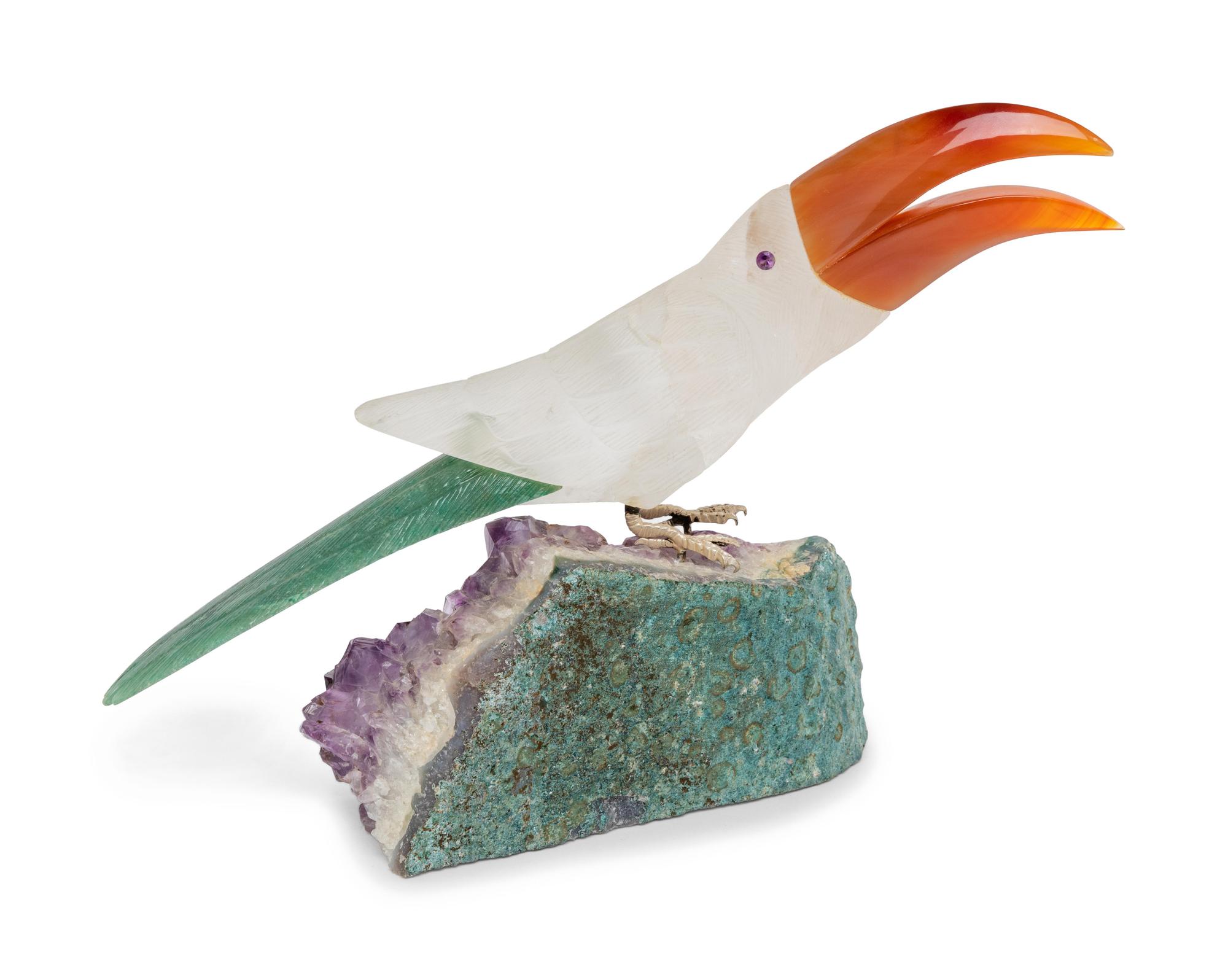 A Carved Crystal Figure of an Owl and a Carved Quartz Figure of a Toucan
