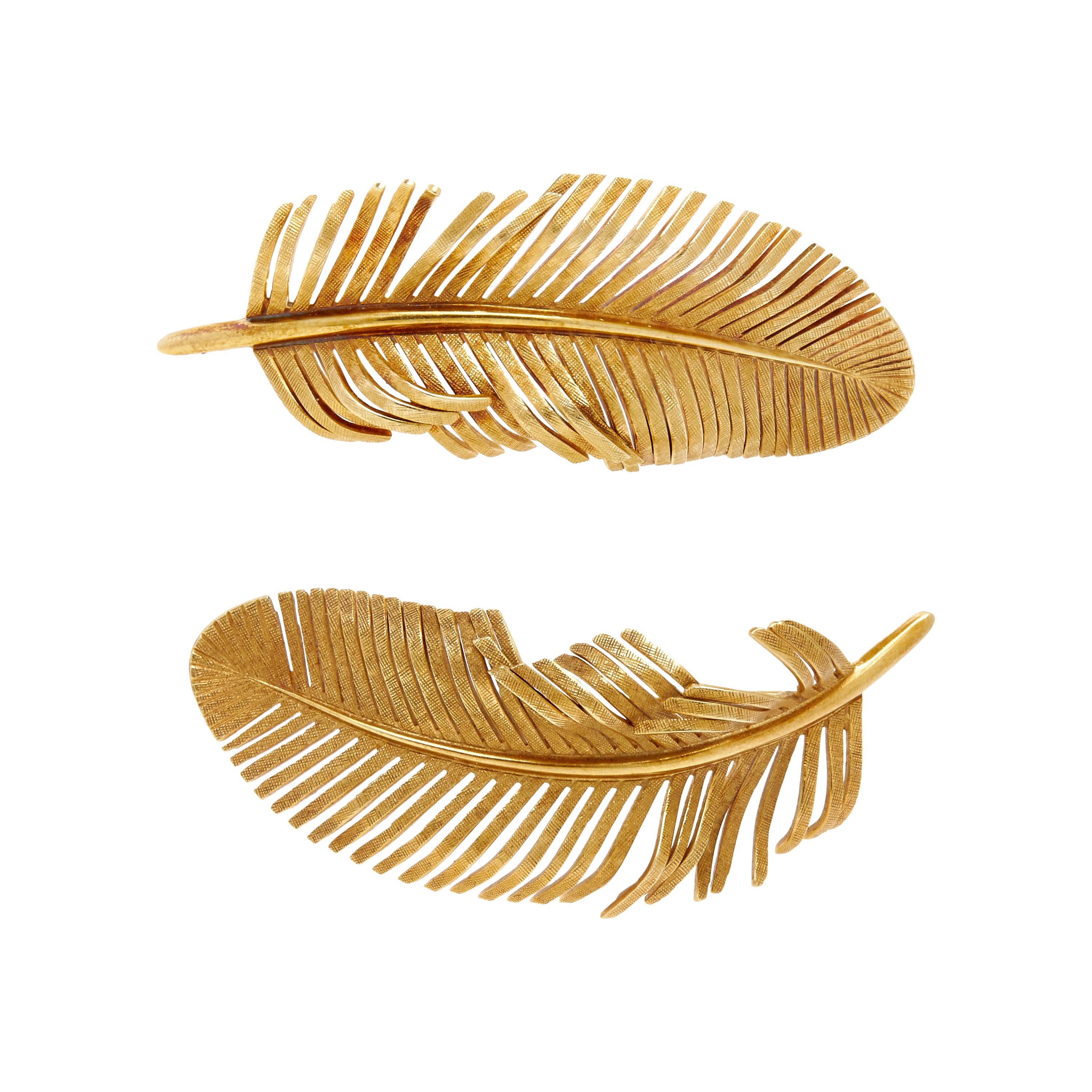 TIFFANY & CO., PAIR OF YELLOW GOLD FEATHER BROOCHES