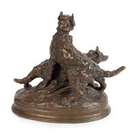 A French Patinated Bronze Group of Dogs — CAST AFTER A MODEL BY THOMAS FRANCOIS CARTIER (FRENCH, 1879-1943)