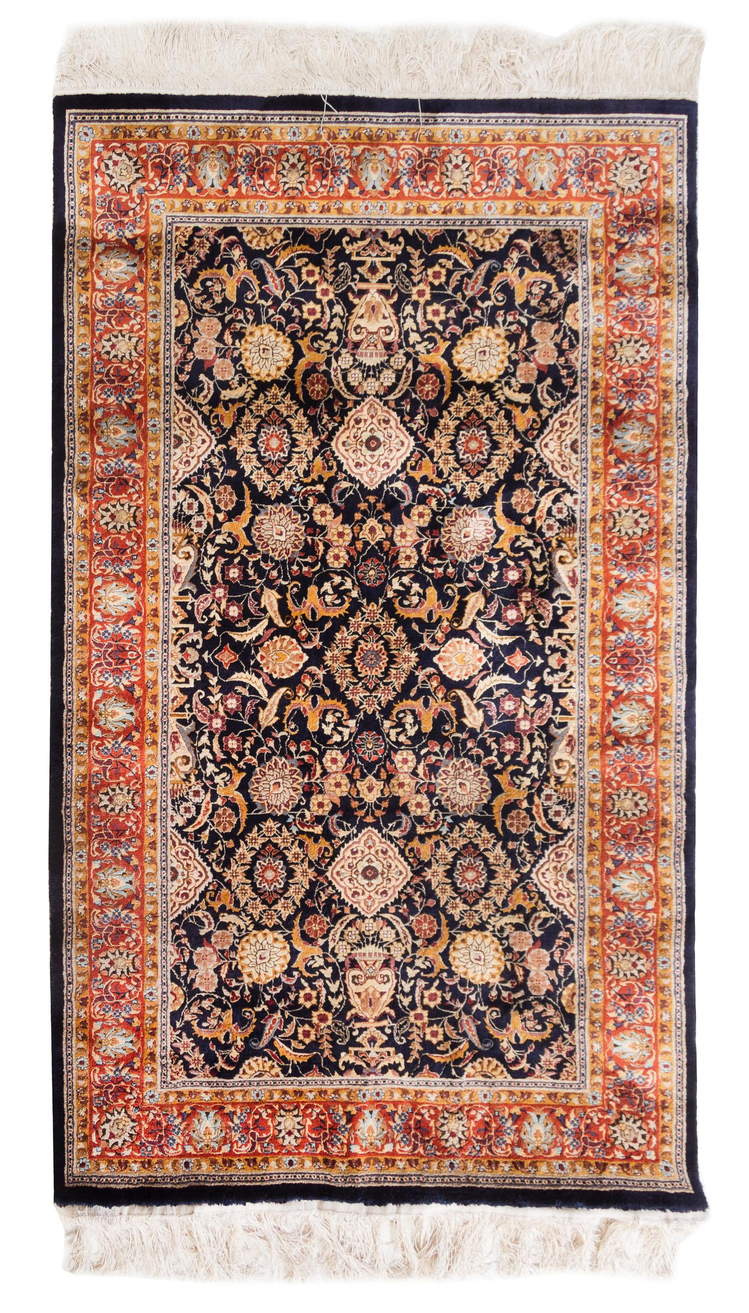 A Silk Rug 5 feet 1 inch x 3 feet 1 inch.