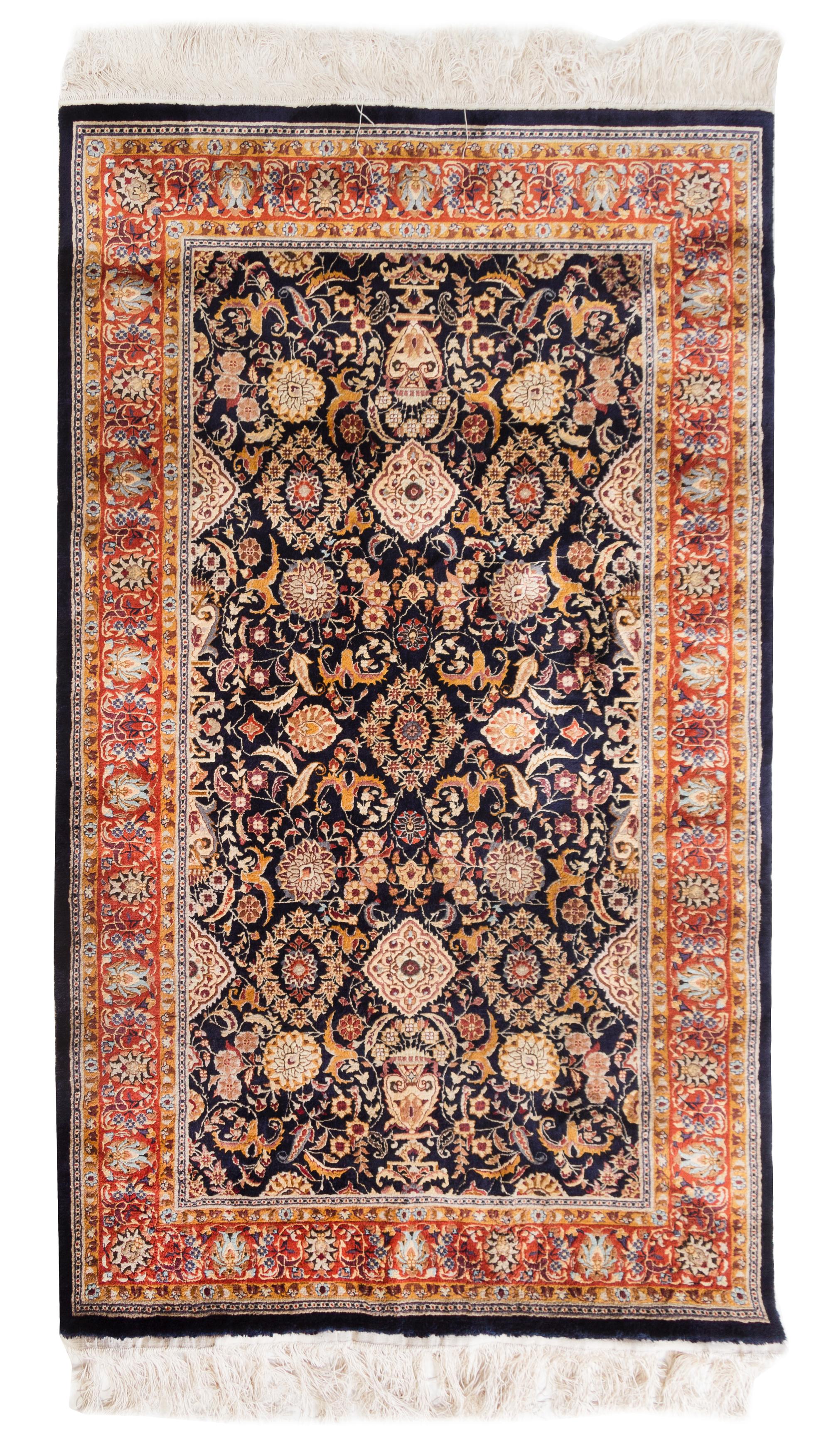 A Silk Rug 5 feet 1 inch x 3 feet 1 inch.