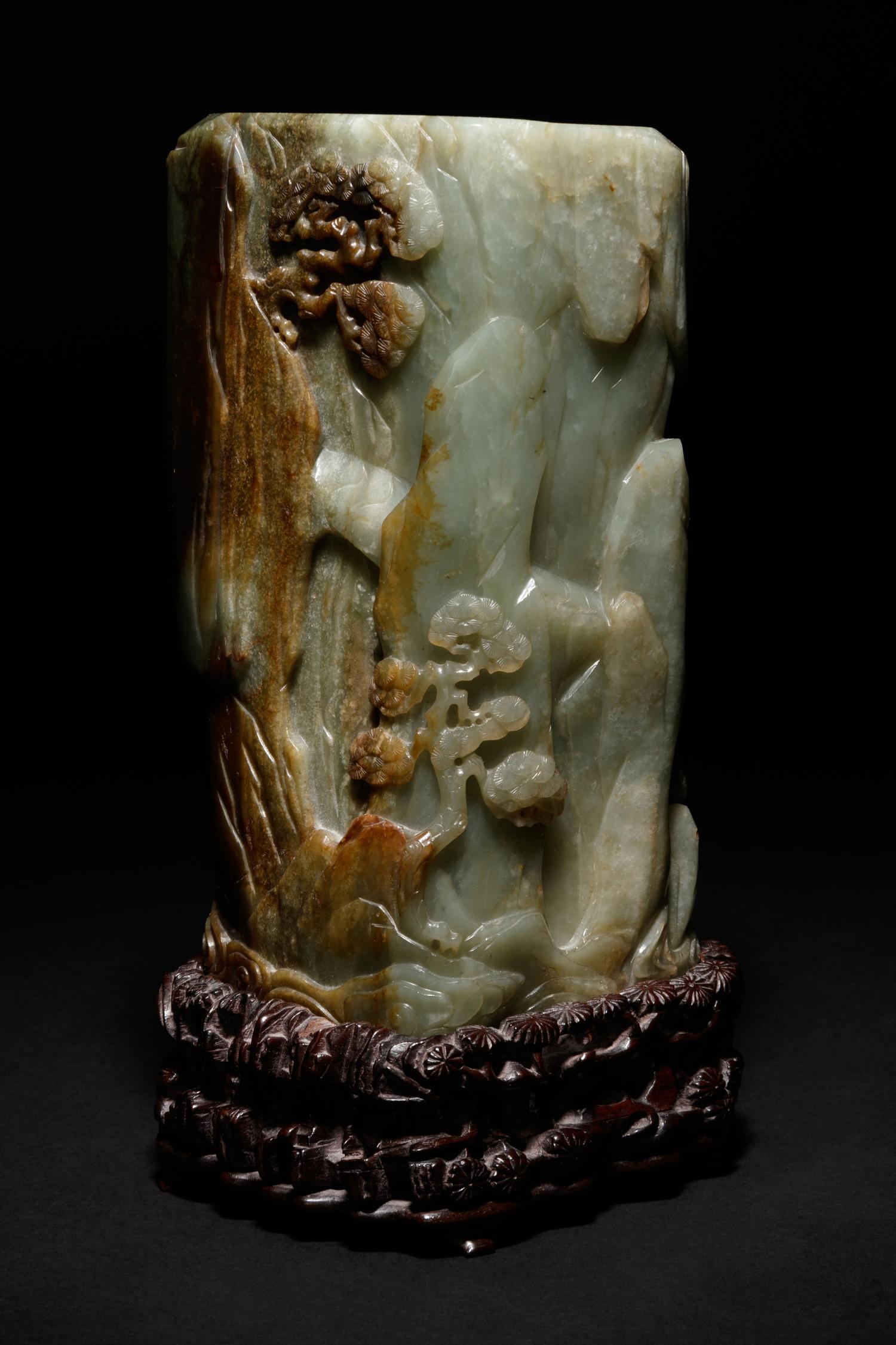 A Carved Celadon and Russet Jade Brush Pot and Stand, Bitong