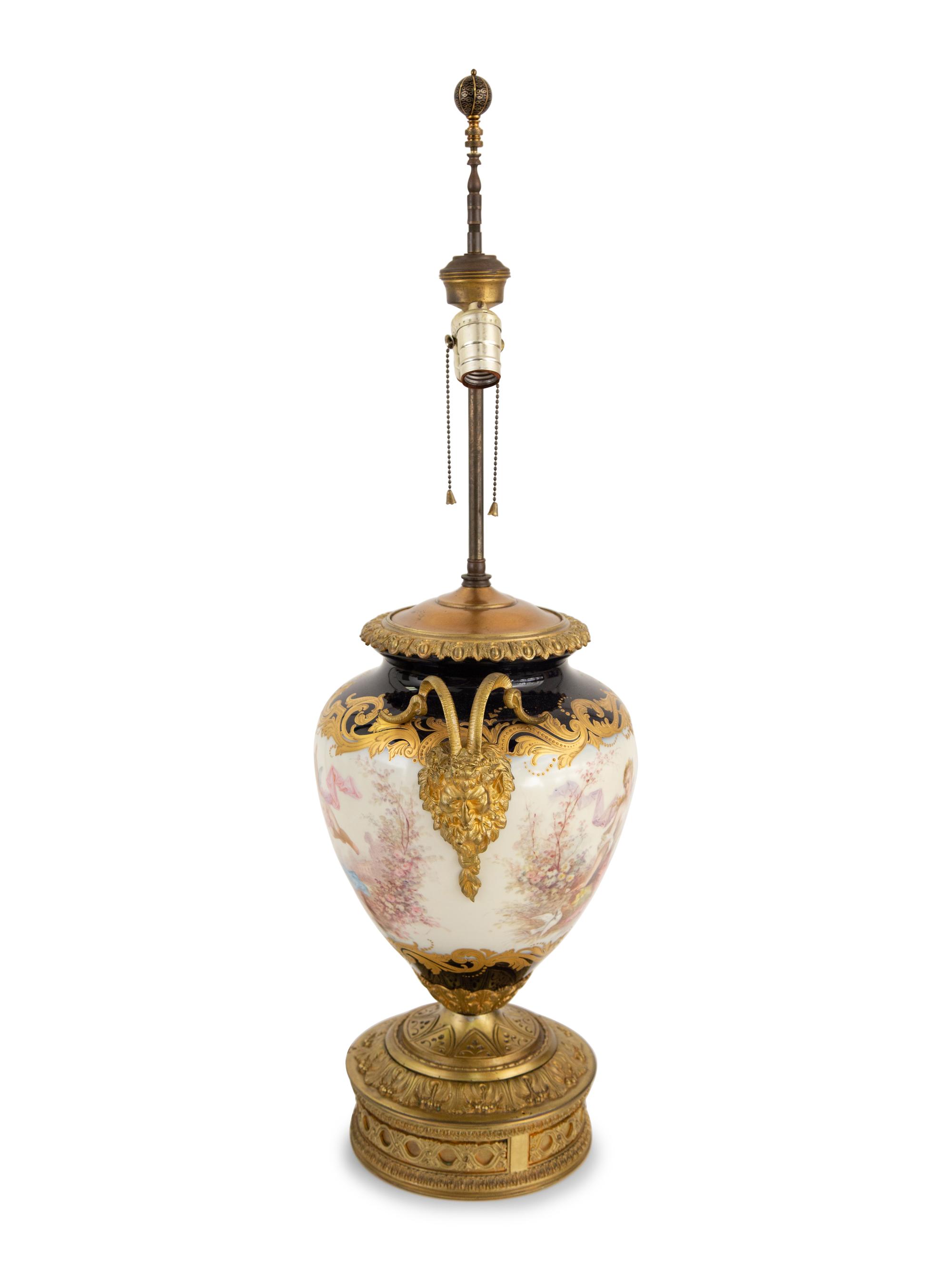 A Gilt Metal and Sèvres Style Porcelain Urn Mounted as a Lamp