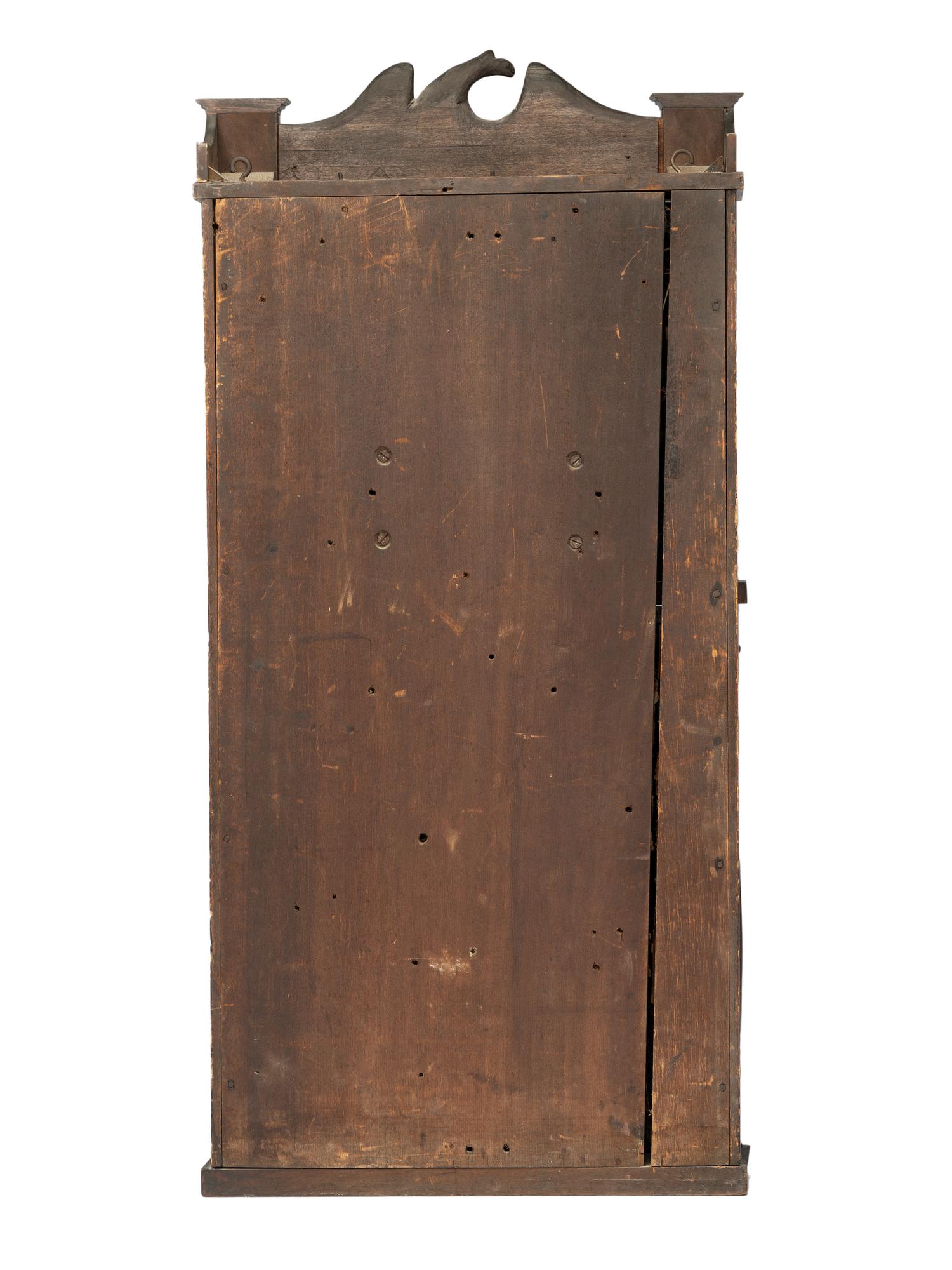 An American Classical Mahogany Eglomise Mantel Clock