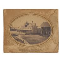 [Lincoln, Abraham]. A group of 3 photographs showing buildings and monuments draped in mourning.