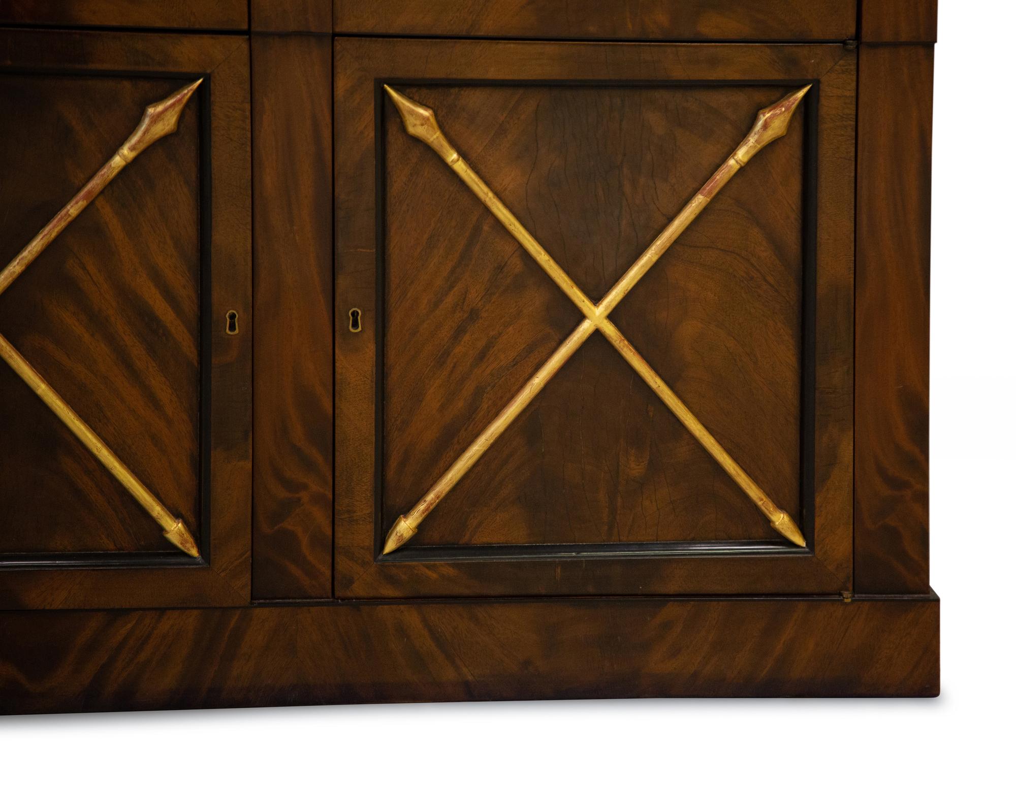 A Empire Style Mahogany and Parcel Gilt Bookcase