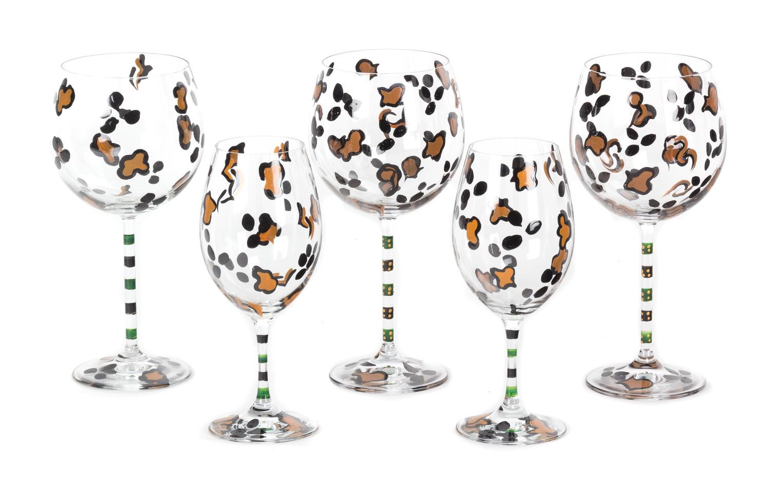 A Set of Hand Painted Leopard Print Stemware Height of tallest 10 inches.