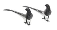 A Pair of Patinated Metal Peasants Height 6 1/4 x length 14 1/4 inches. — 19TH CENTURY