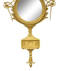 An Adam Style Giltwood Convex Mirror