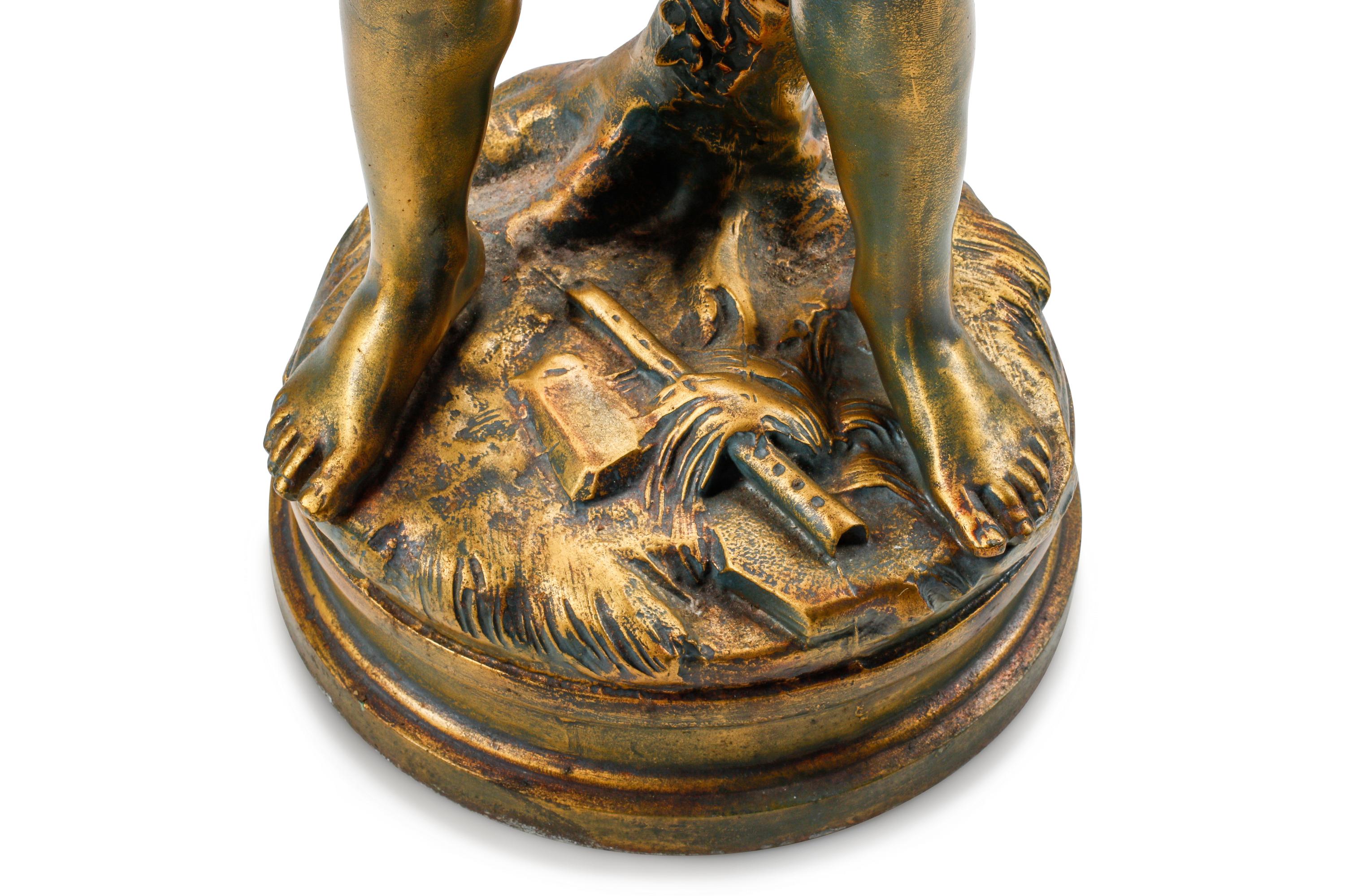 A French Gilt Metal Figure of a Flute Player