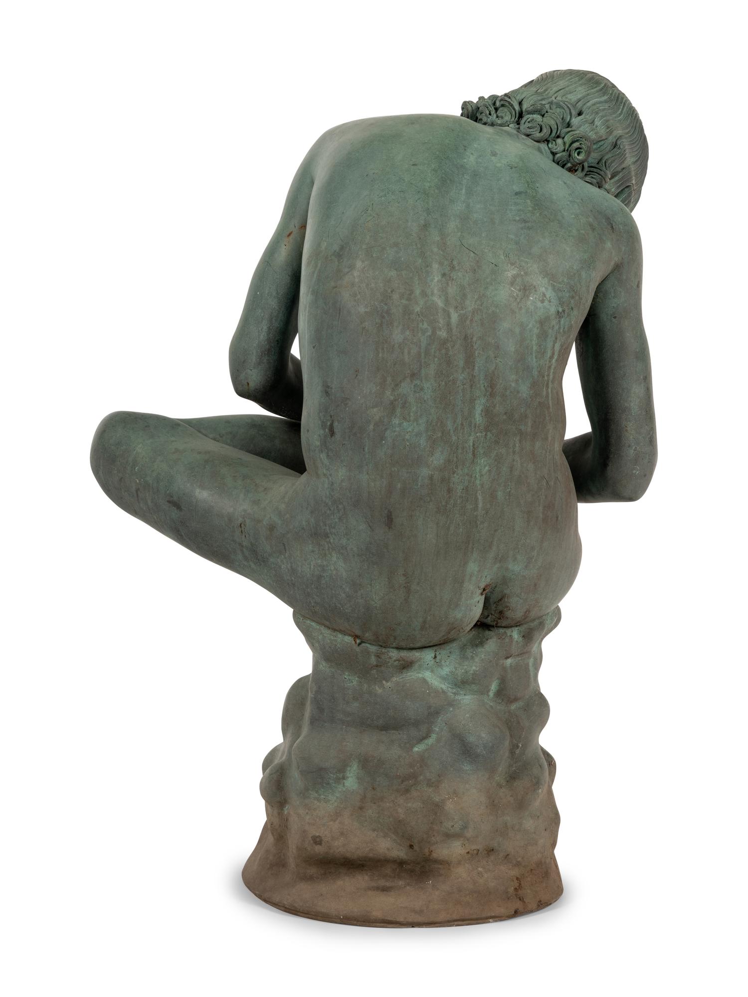 A Patinated Bronze Figure of the Spinario