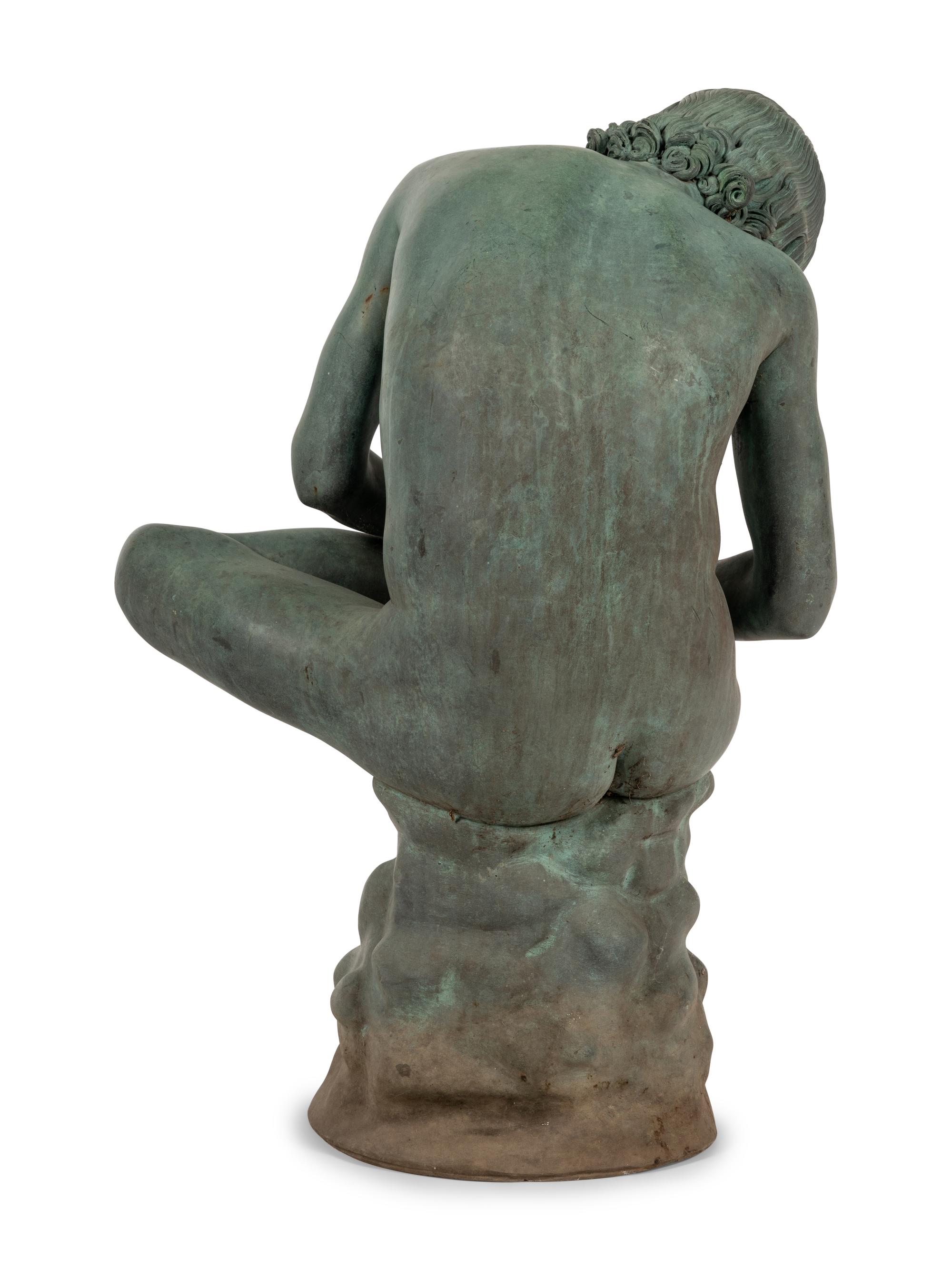 A Patinated Bronze Figure of the Spinario