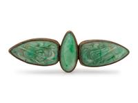 A Yellow Gold and Jade Brooch,