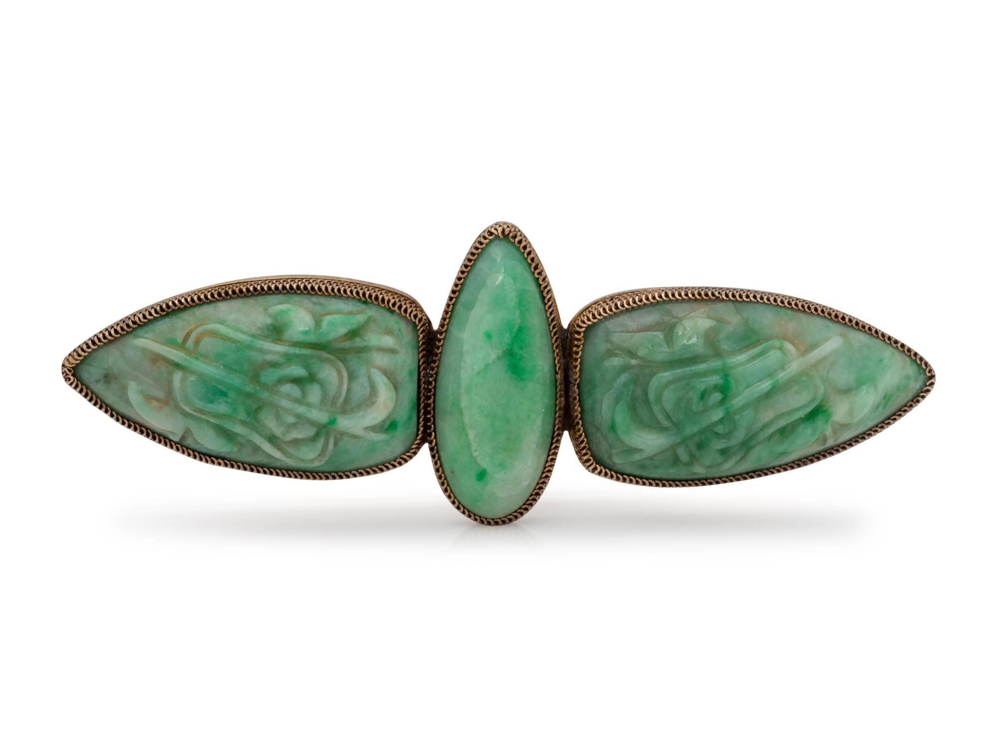 A Yellow Gold and Jade Brooch,
