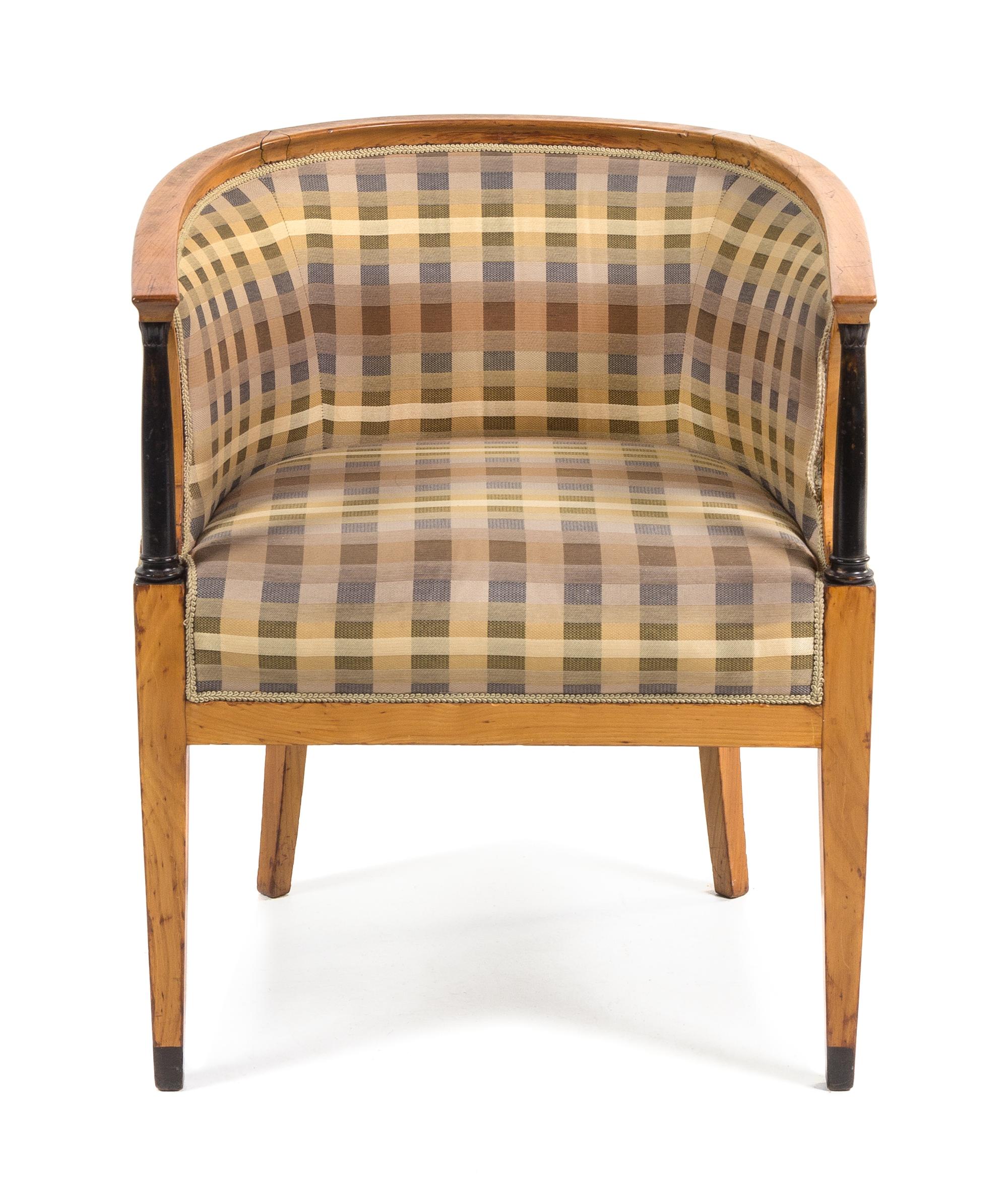A Biedermeier Parcel Ebonized Tub Chair Height 29 inches. — SECOND QUARTER 19TH CENTURY