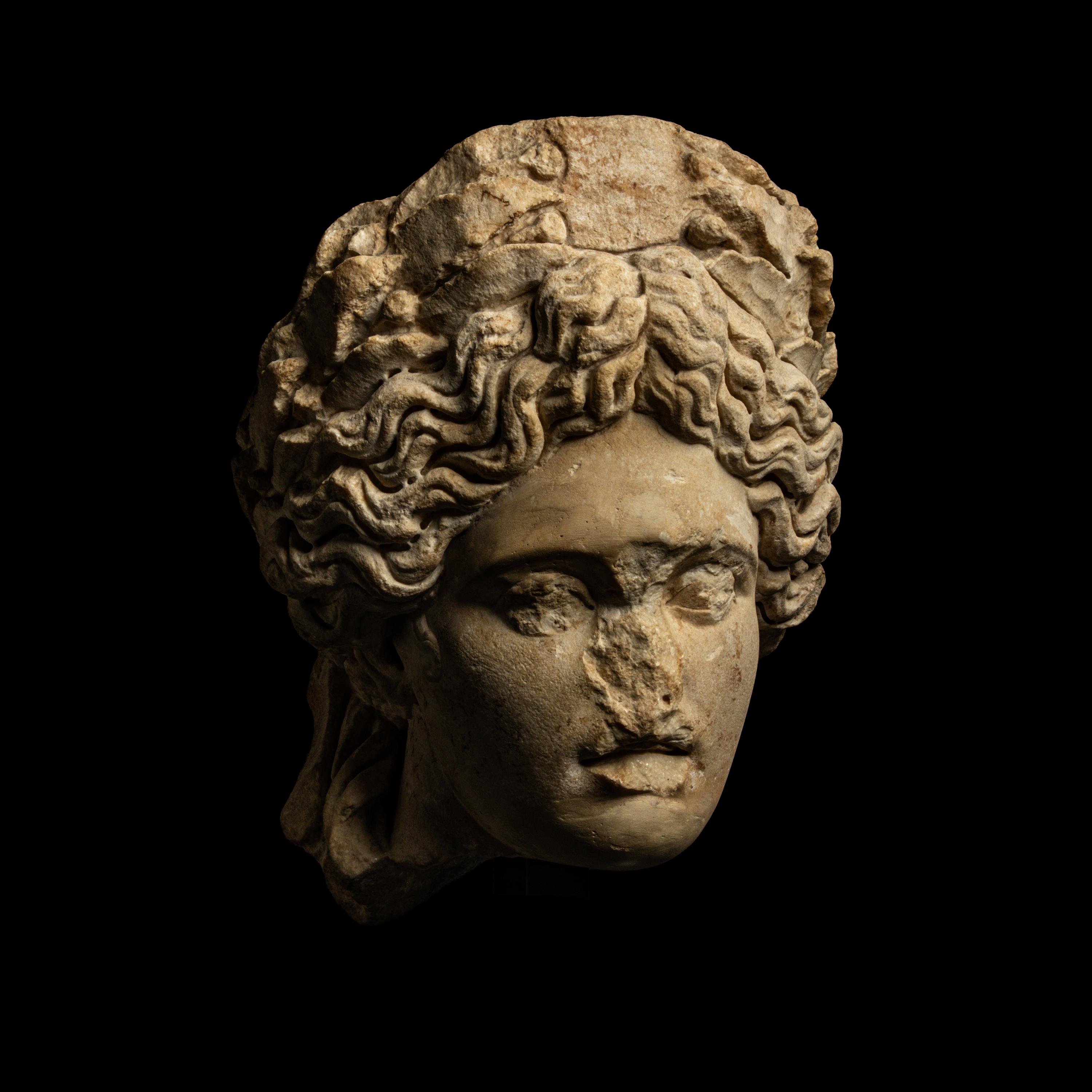 A Roman Marble Head of Apollo Citharoedus