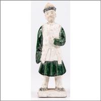 A Chinese Terracotta Figure with Polychrome Decoration