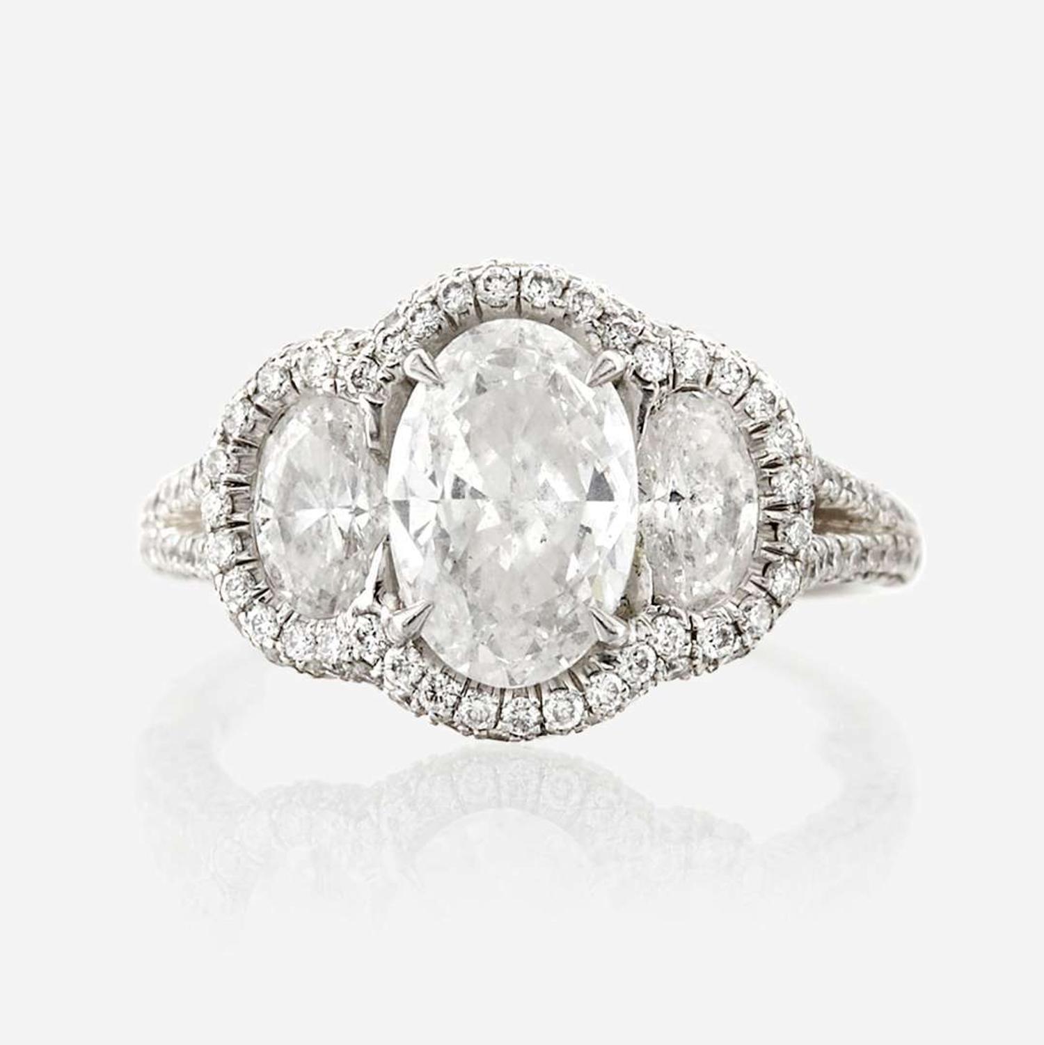 A diamond and platinum ring, JB Star