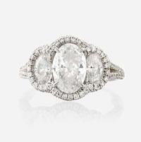 A diamond and platinum ring, JB Star