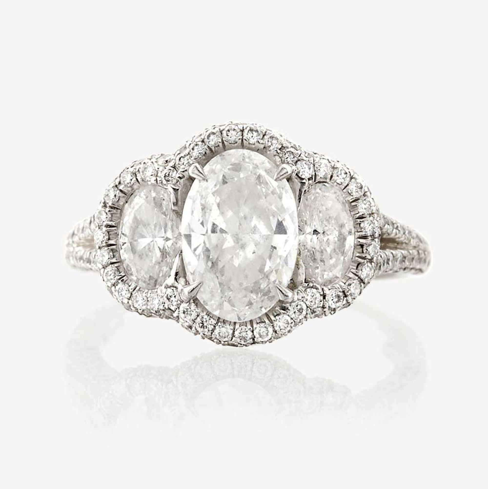 A diamond and platinum ring, JB Star