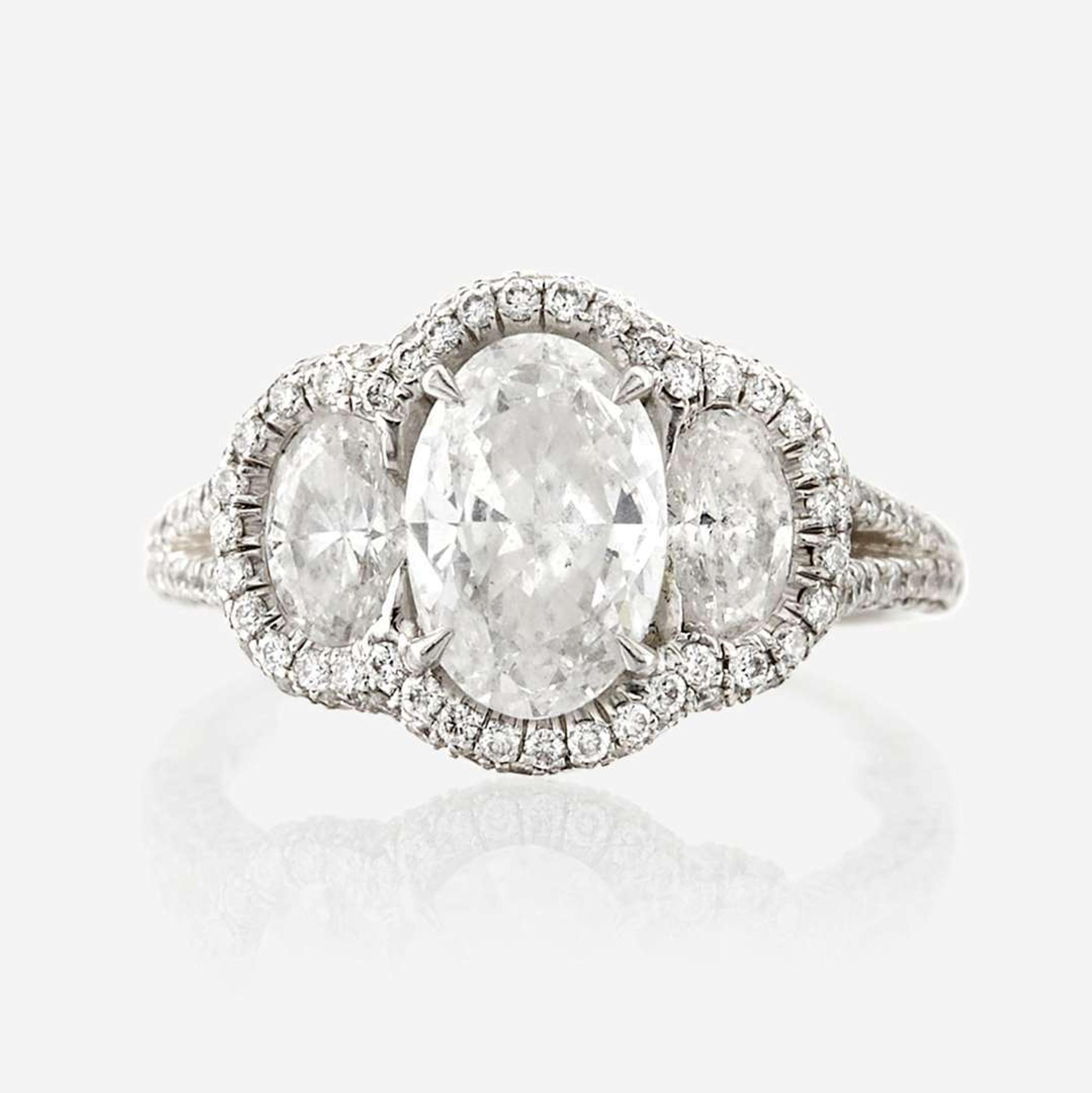A diamond and platinum ring, JB Star
