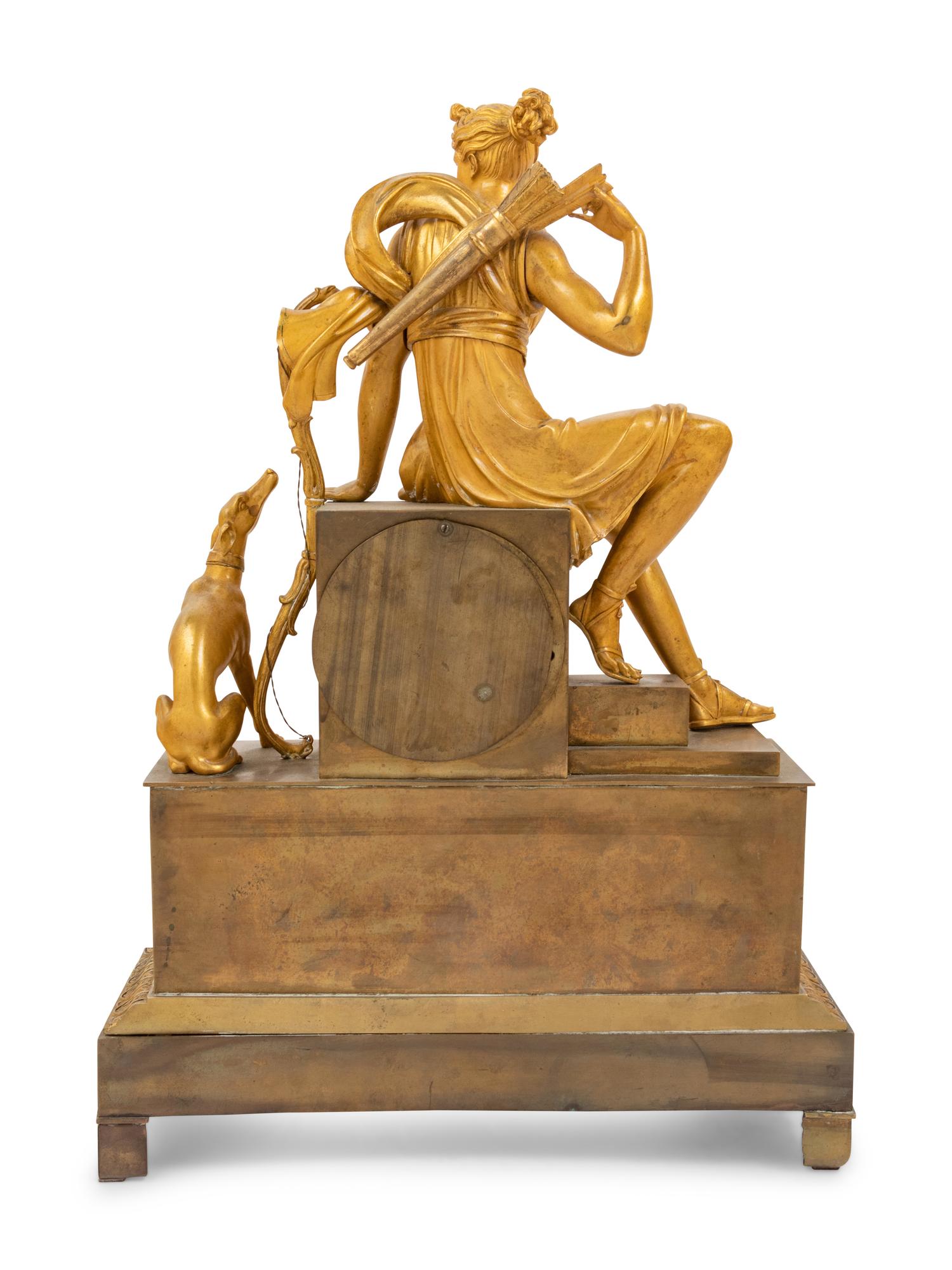 An Empire Style Gilt Bronze Figural Mantel Clock