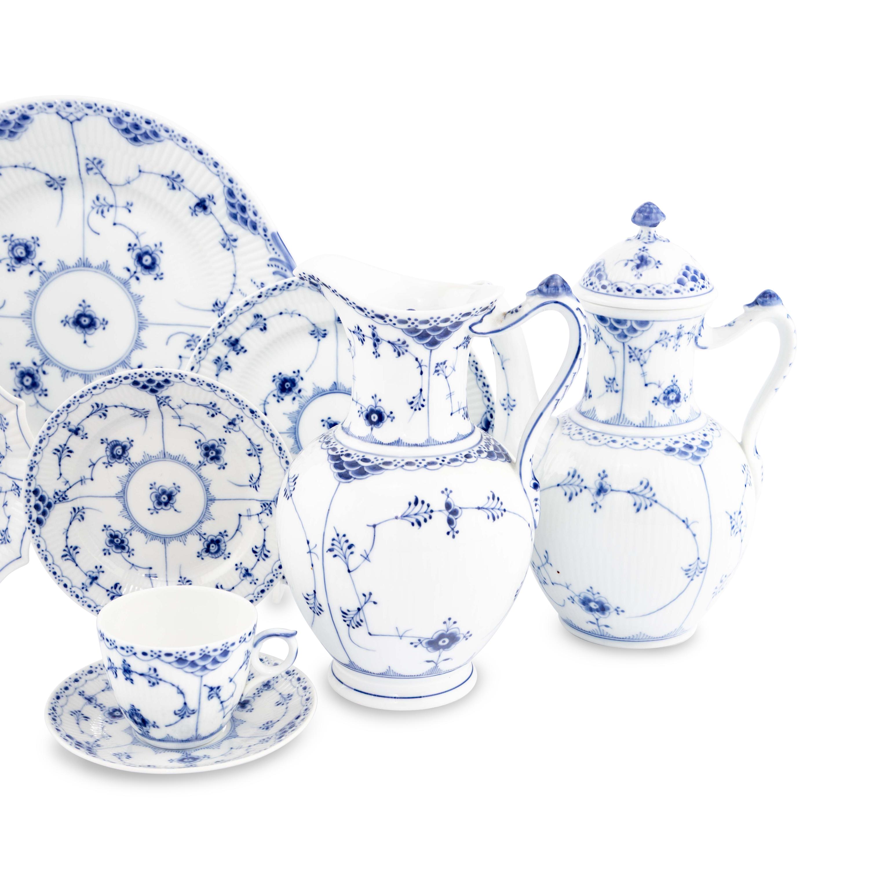 A Royal Copenhagen Blue Fluted Half Lace Porcelain Luncheon Service