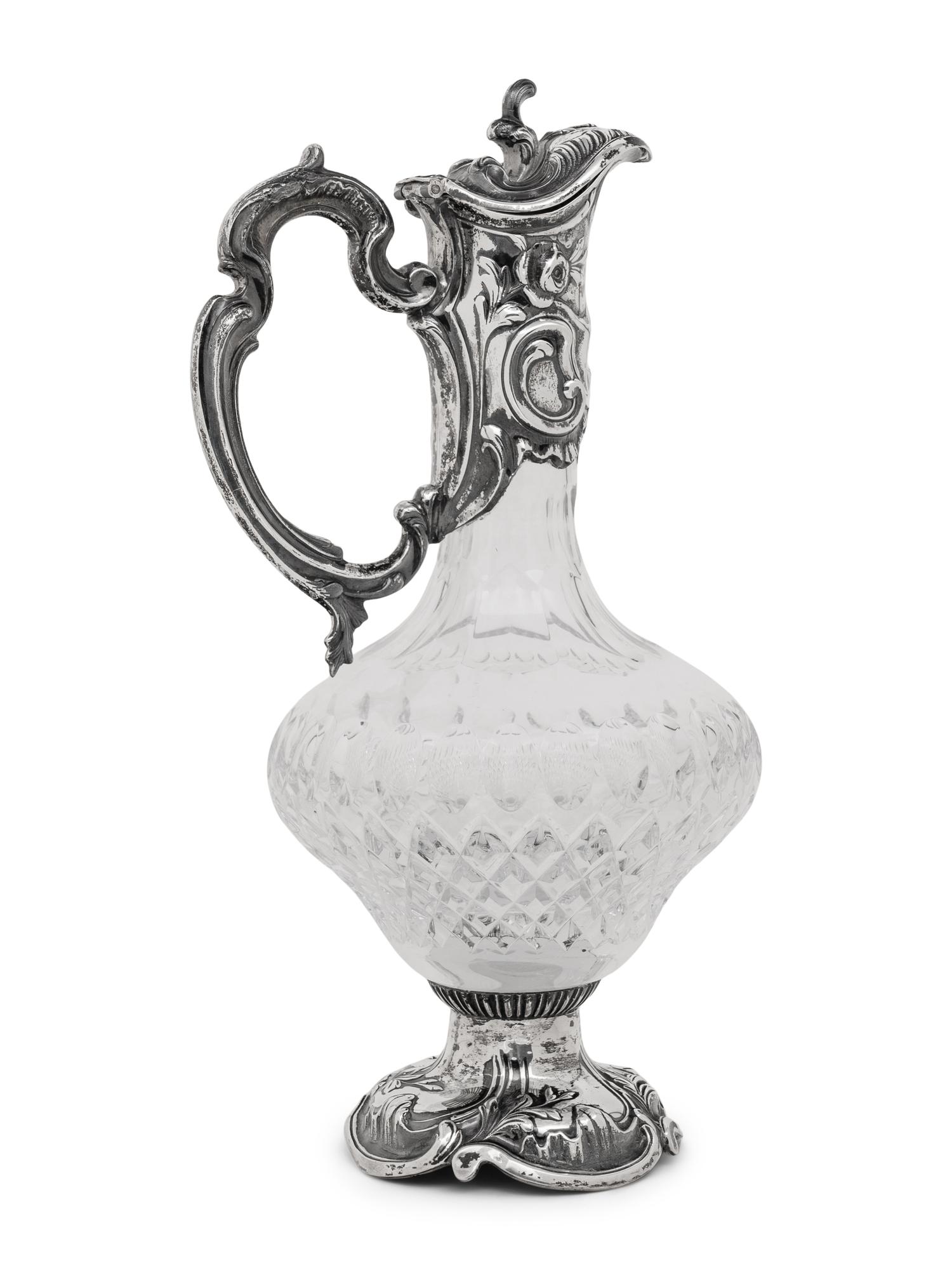 A Portuguese Silver Mounted Cut Glass Claret Jug