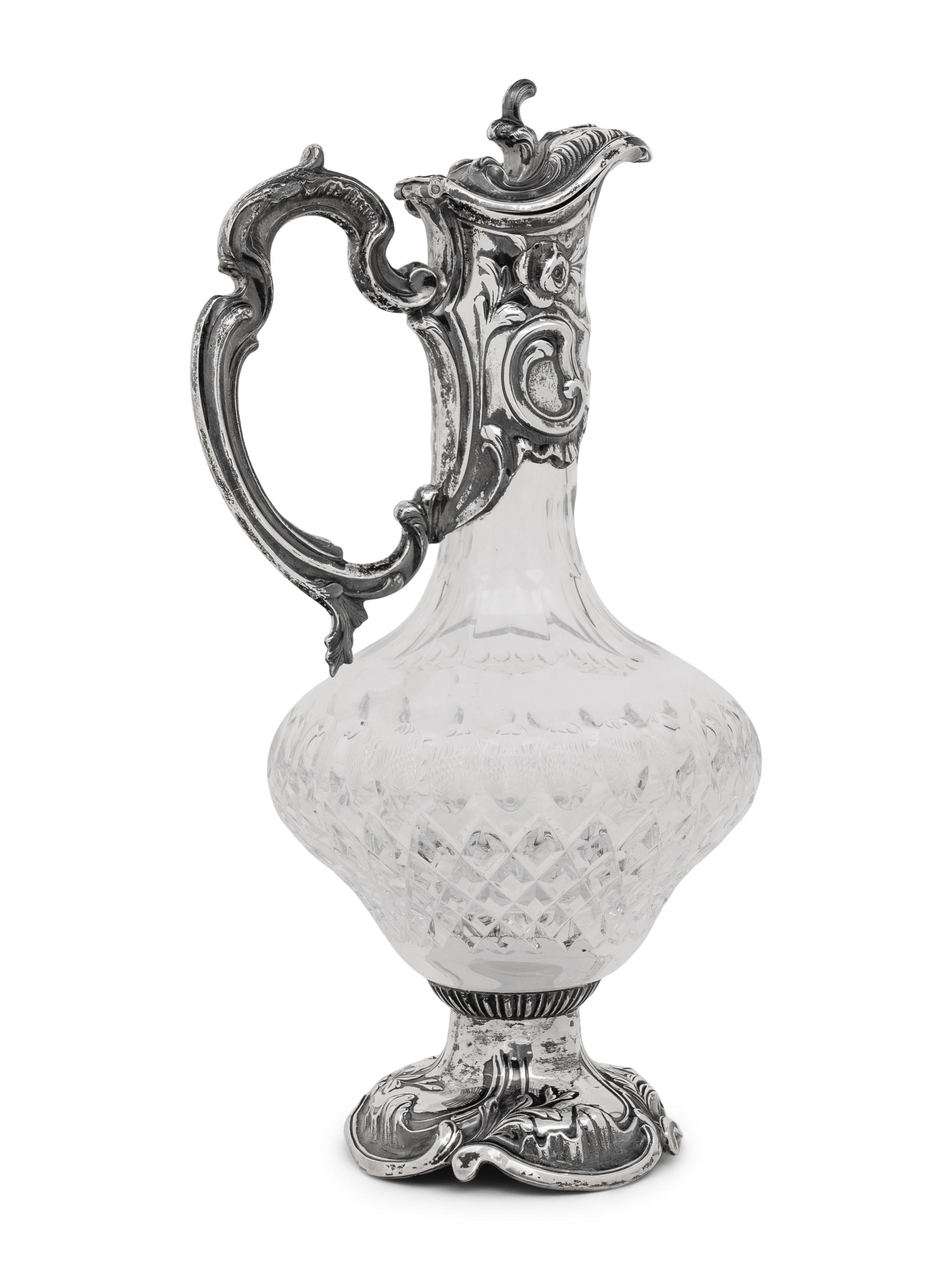 A Portuguese Silver Mounted Cut Glass Claret Jug