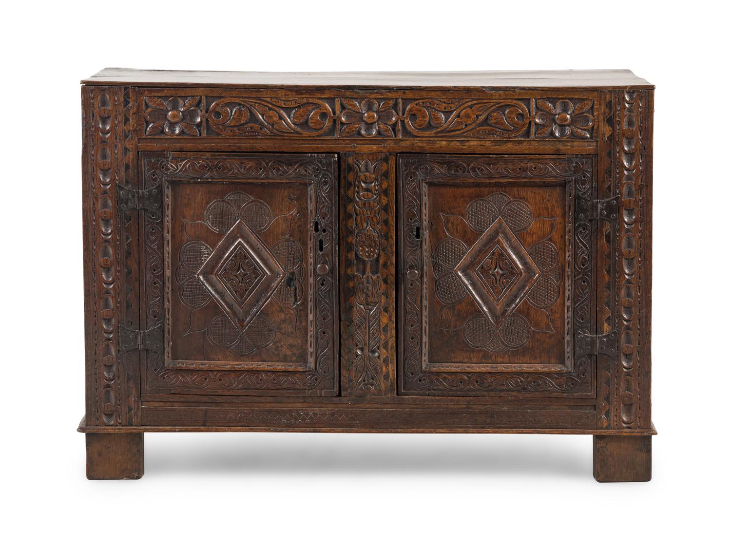 A Welsh Carved Oak Side Cabinet