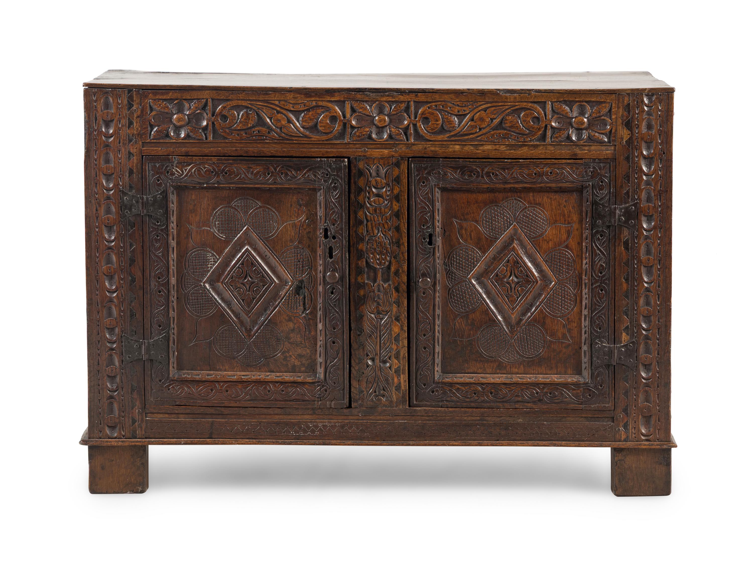 A Welsh Carved Oak Side Cabinet
