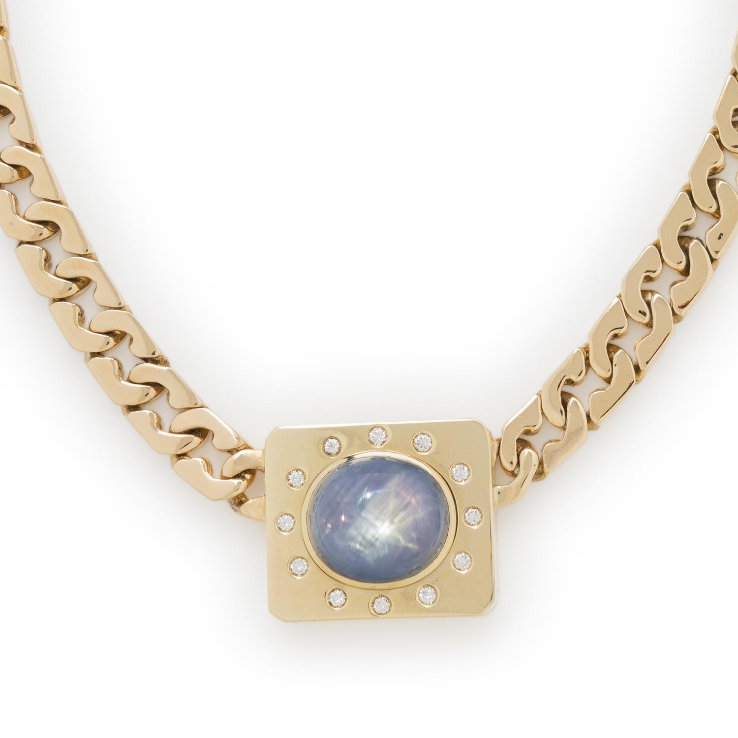 YELLOW GOLD, STAR SAPPHIRE, AND DIAMOND NECKLACE