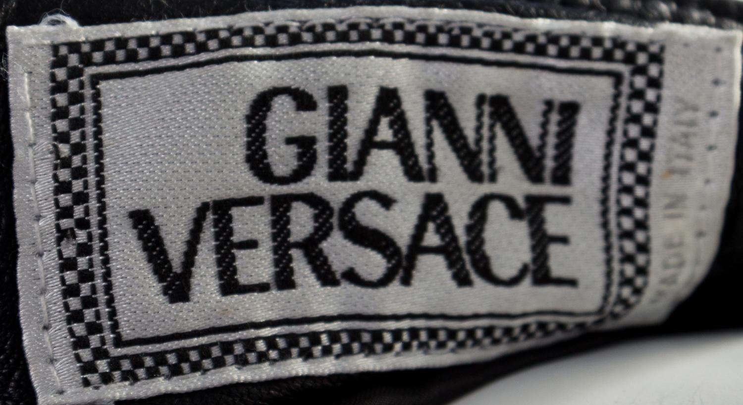 A Gianni Versace Black Leather Bondage Pant,