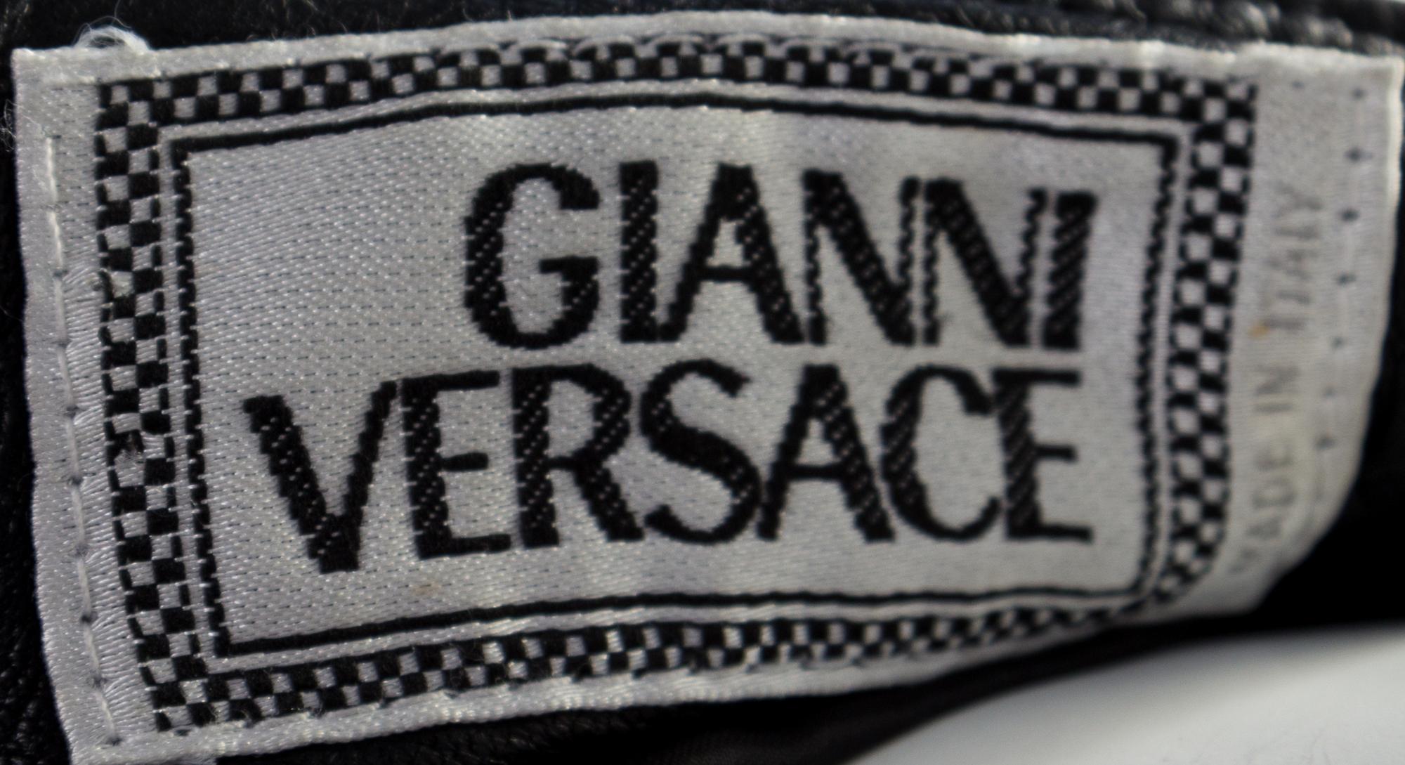 A Gianni Versace Black Leather Bondage Pant,