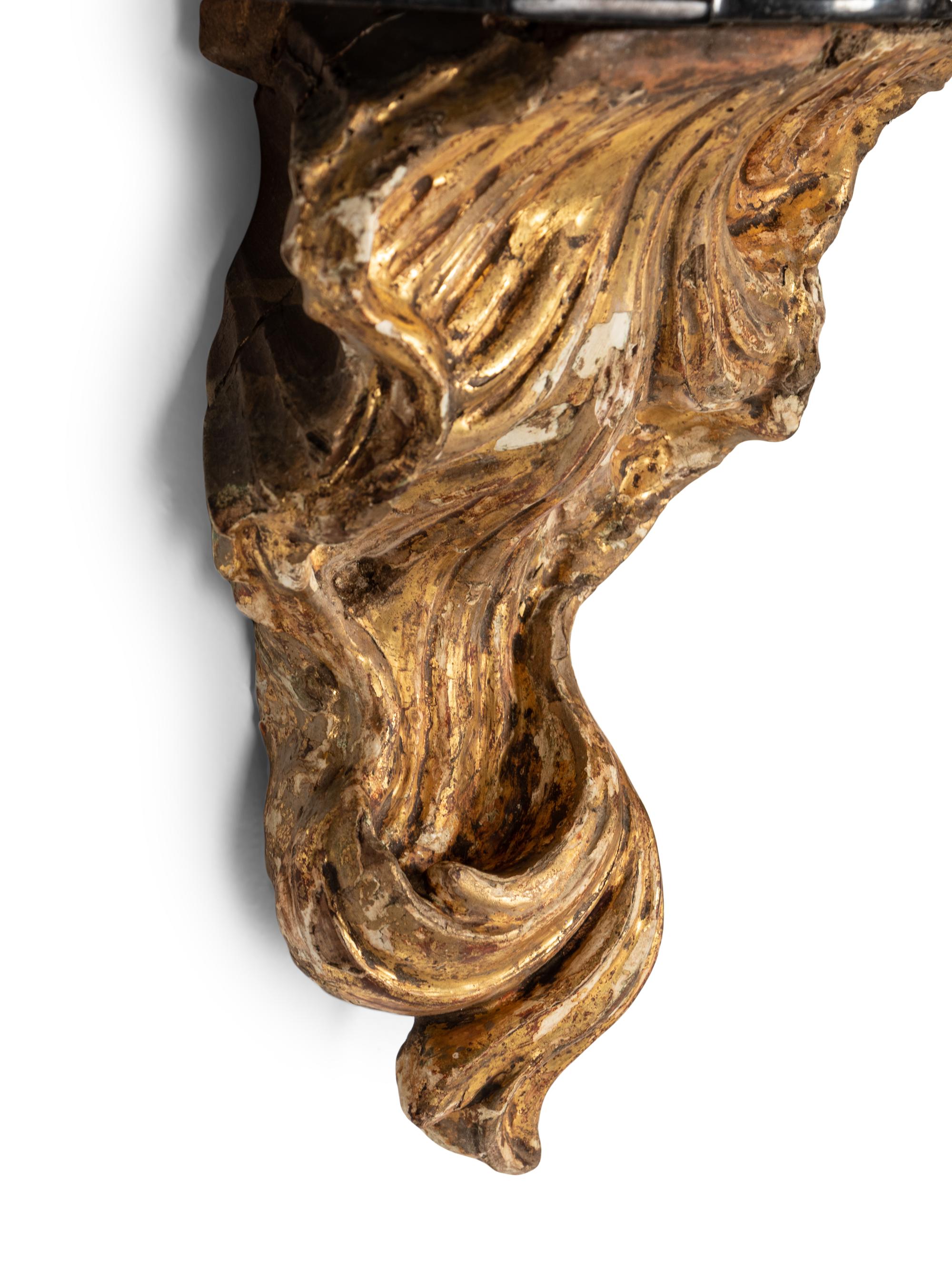 A Pair of Continental Giltwood Marble-Top Brackets