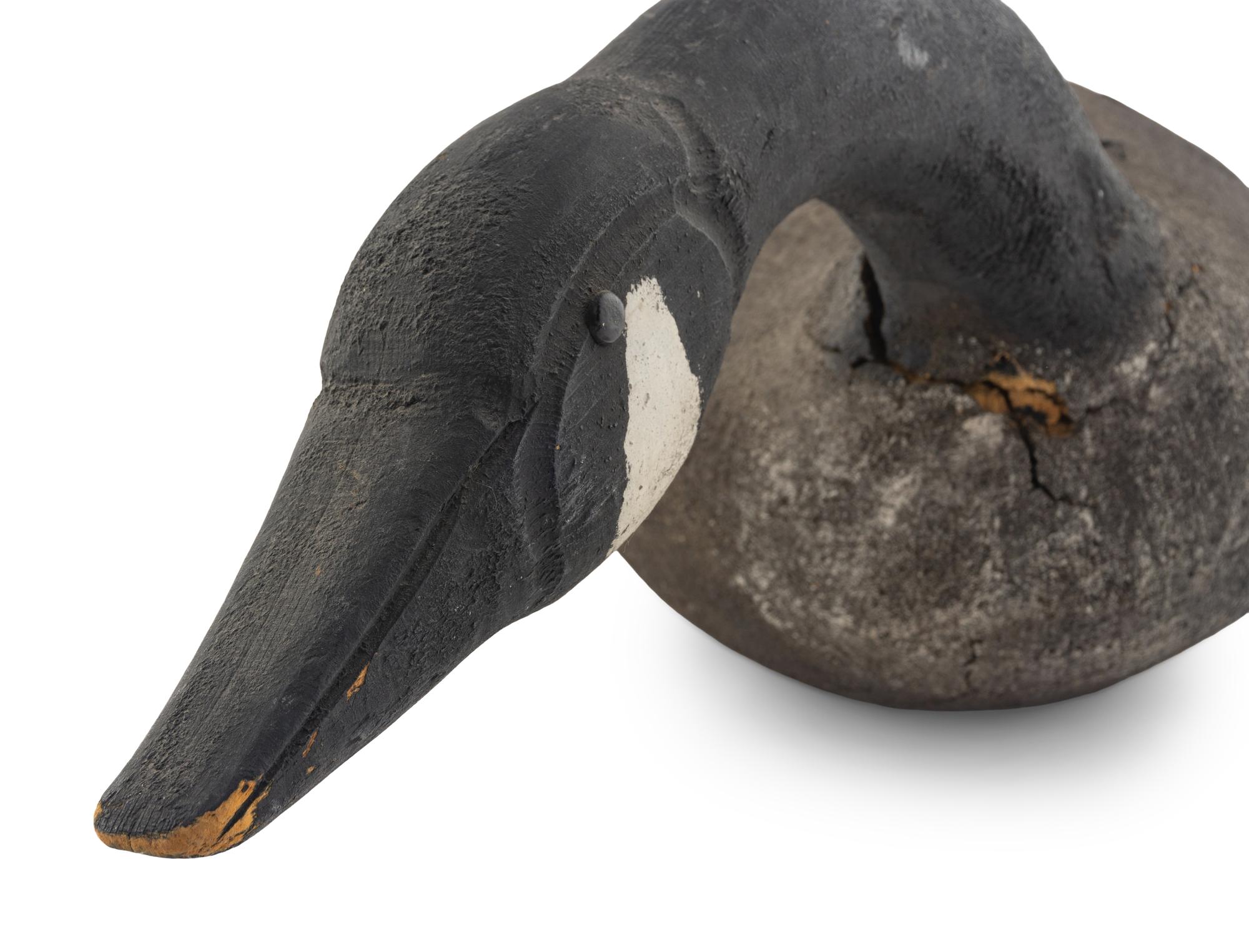 A Carved and Painted Wood Canada Goose Decoy